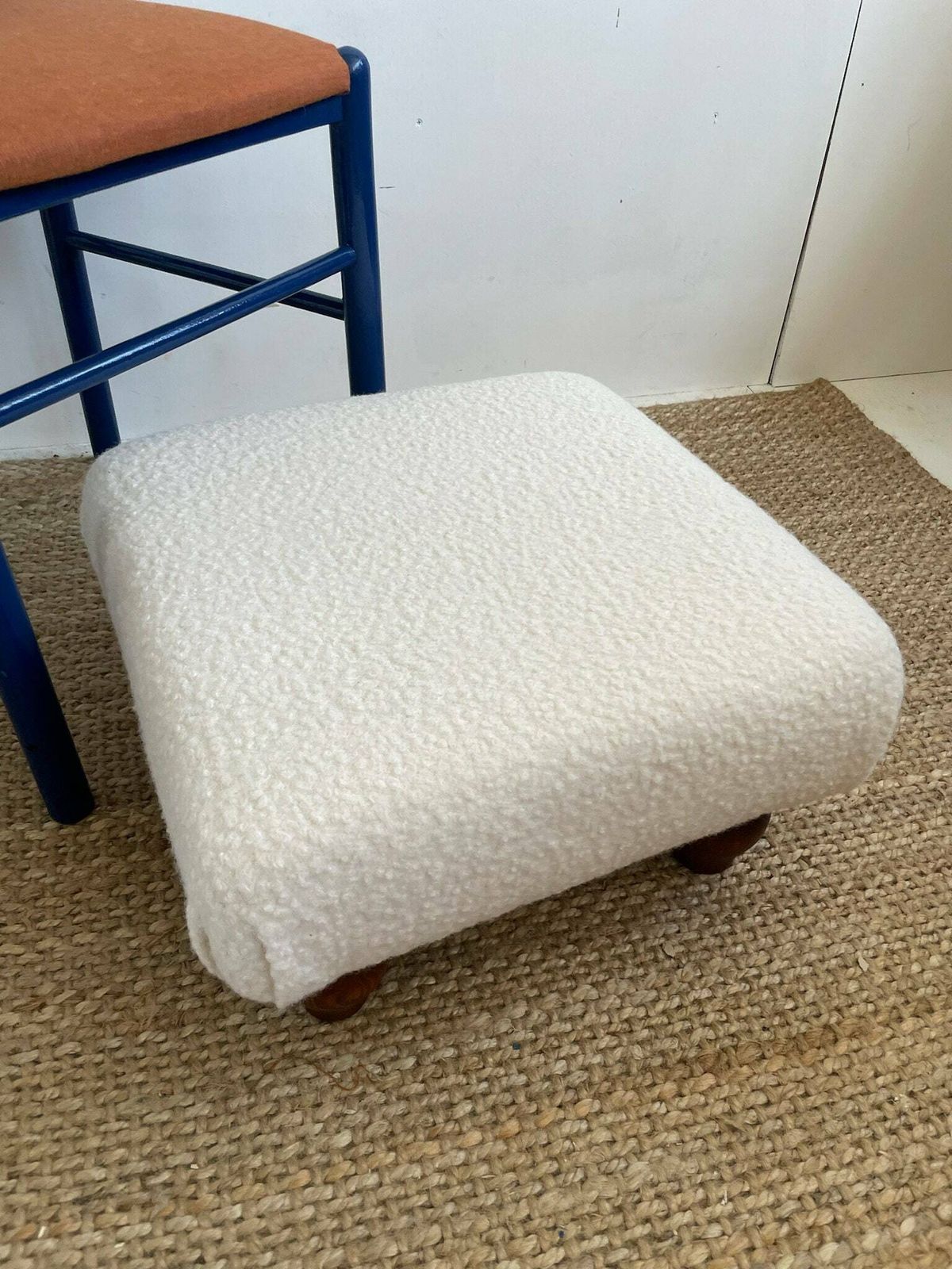 Chunky Low Lying Footstool With Tapered Legs And Cream Boucle Fabric photo buy