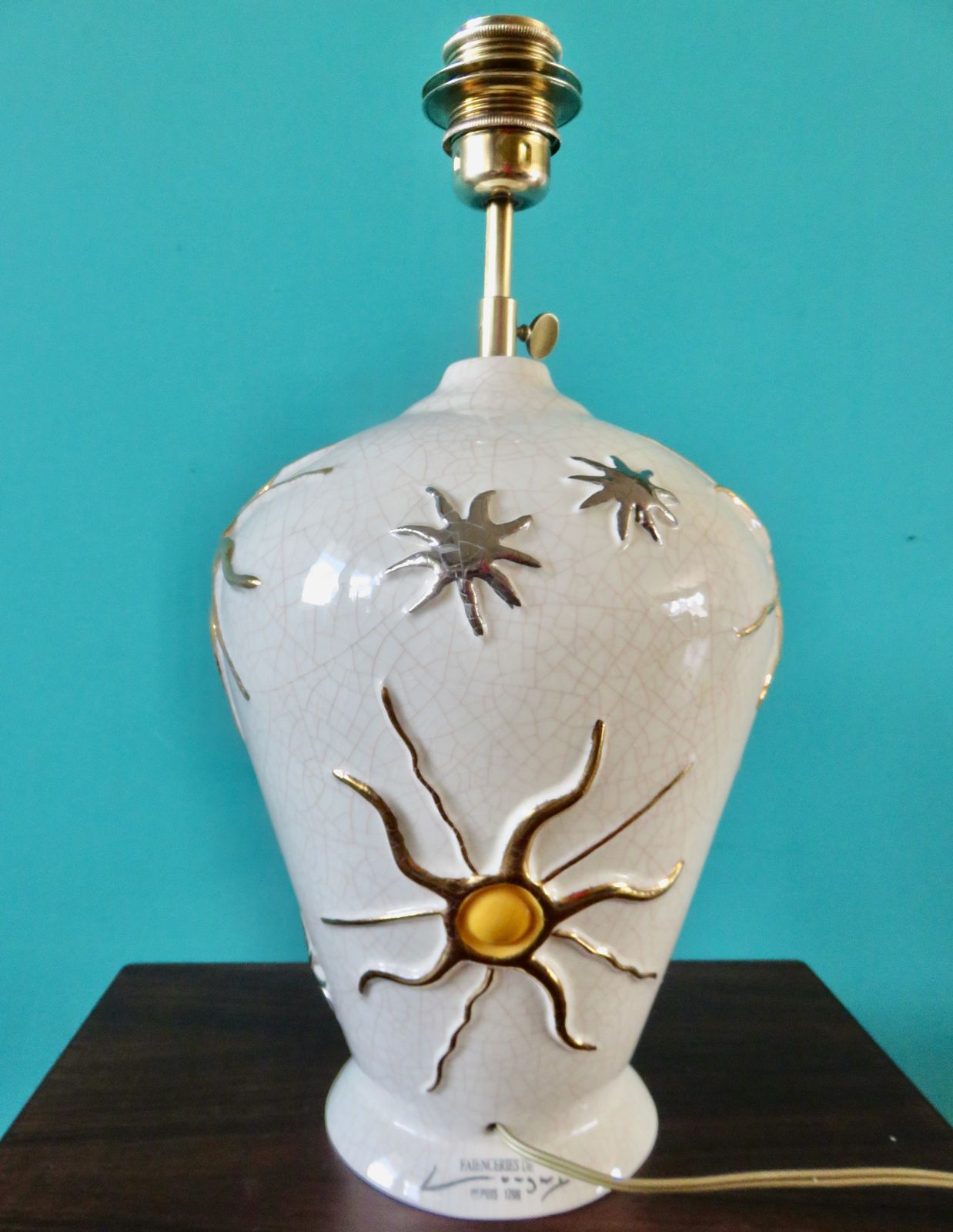 Large Ecru Cracked "Longwy" Earthenware Lamp With Bas Relief Of Suns And Stars. France 1945 1950 photo for sale
