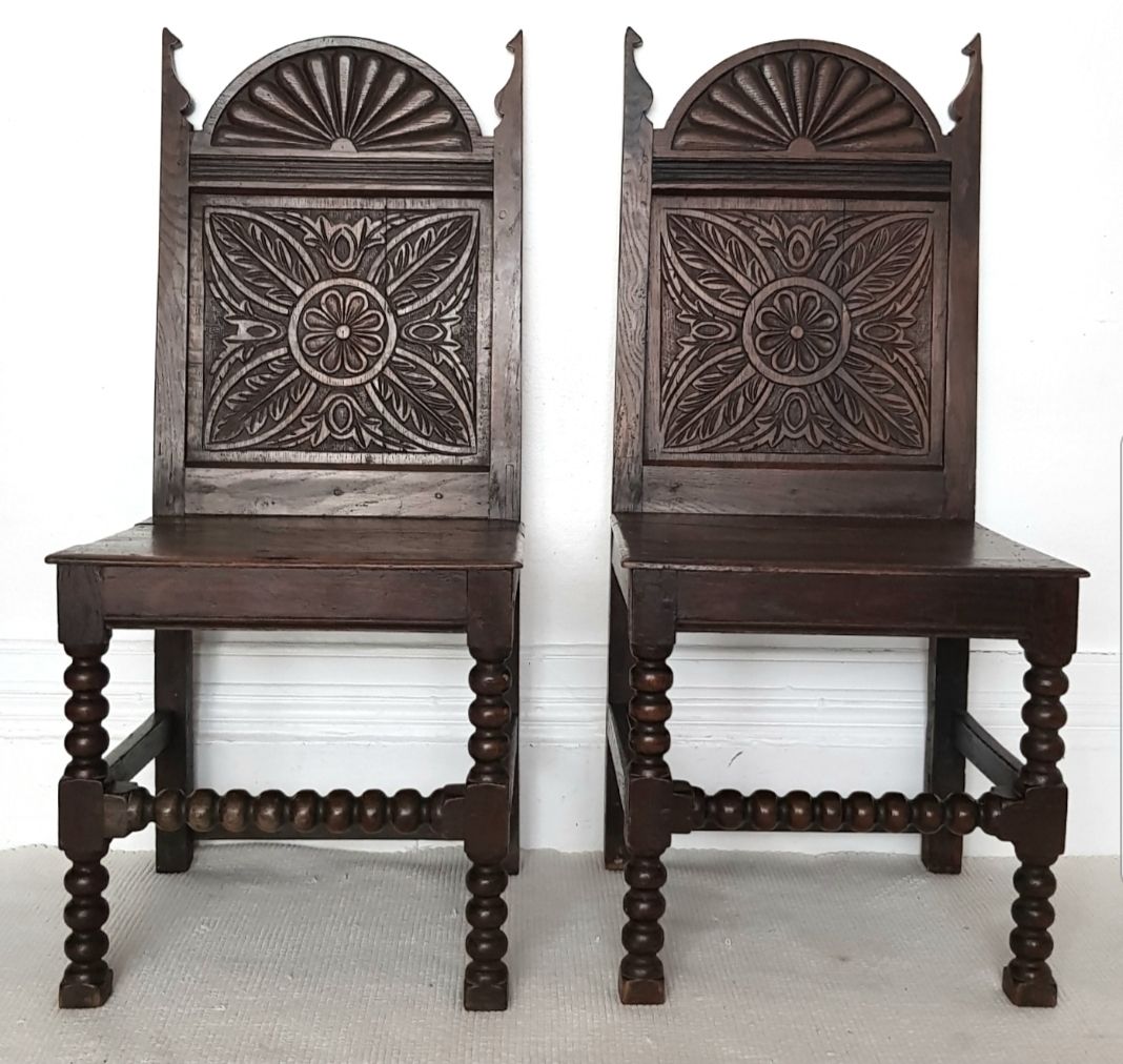 A Pair Of 16th Century Carved Oak Hall Chairs.