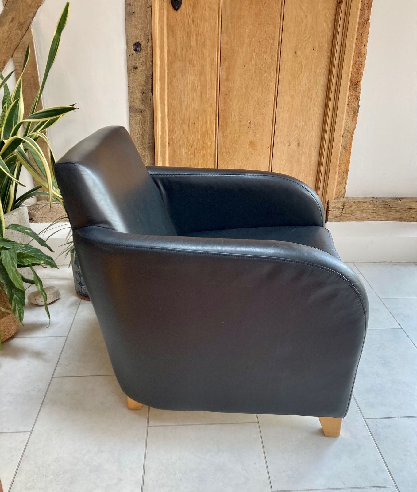 Black Leather Club Chair From Heals By Designer Roger Lewis photo vintage