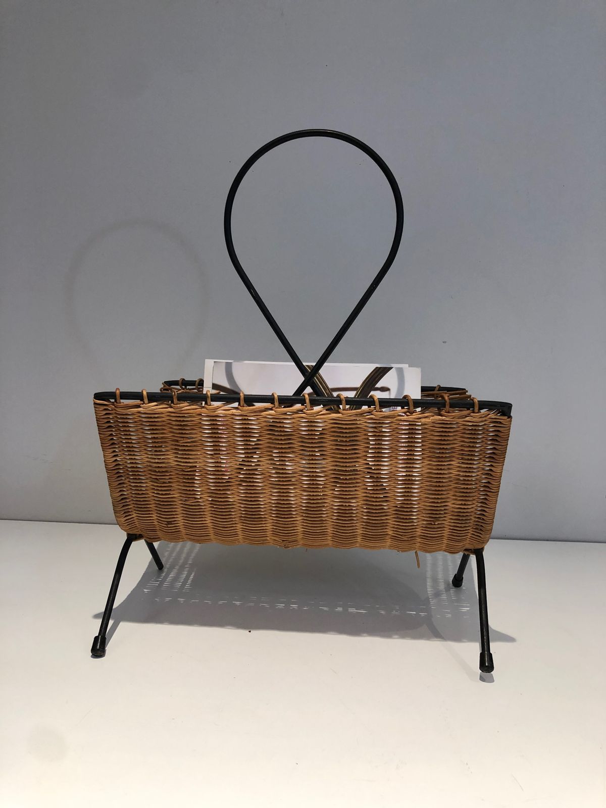 photo buy Rattan And Black Lacquered Metal Magazine Rack
