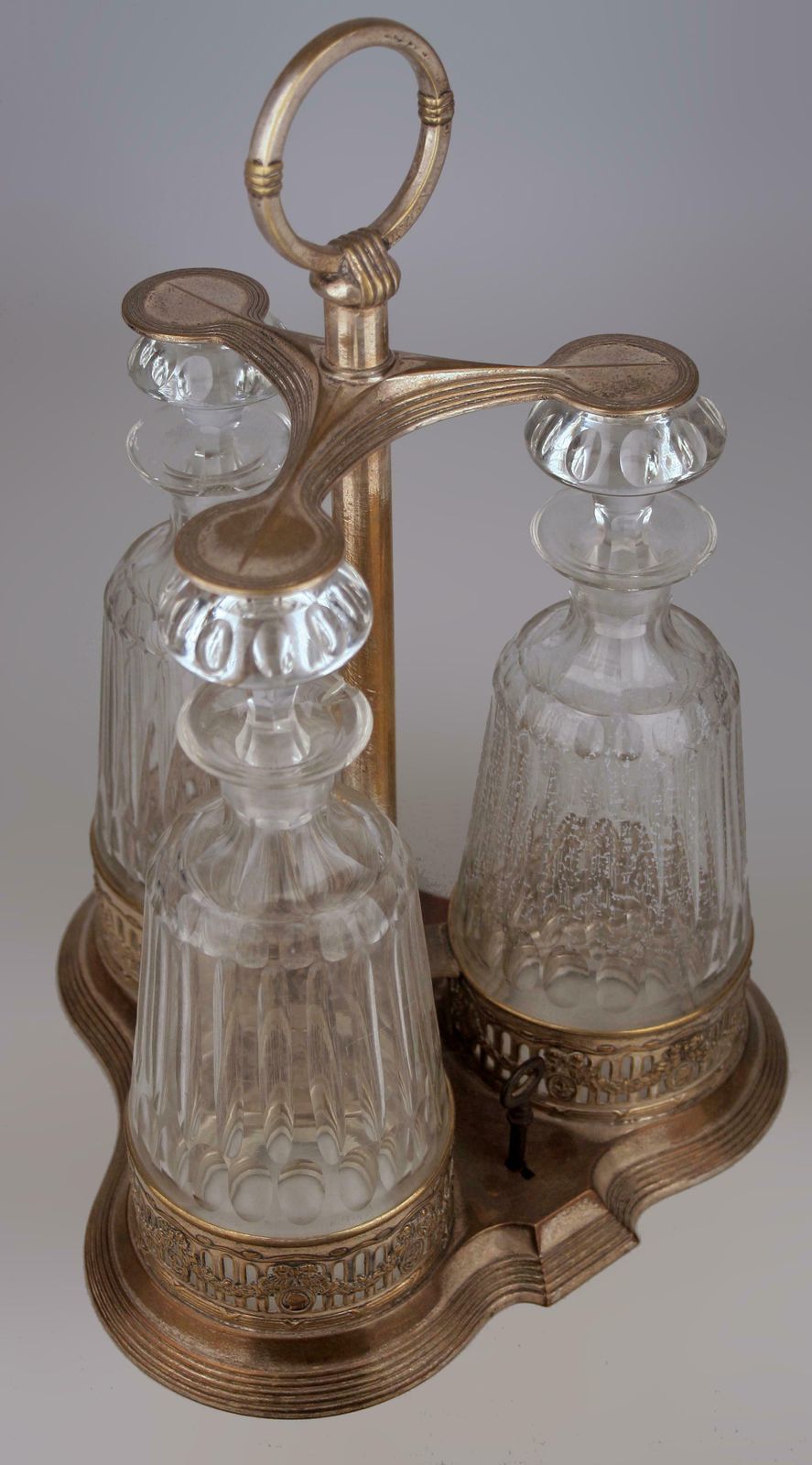 photo for sale Jugendstil/Art Nouveau Set Of Silver Tantalus And Three Glass Decanters With Stoppers By German Company Württembergische Metallwarenfabrik (Wmf)