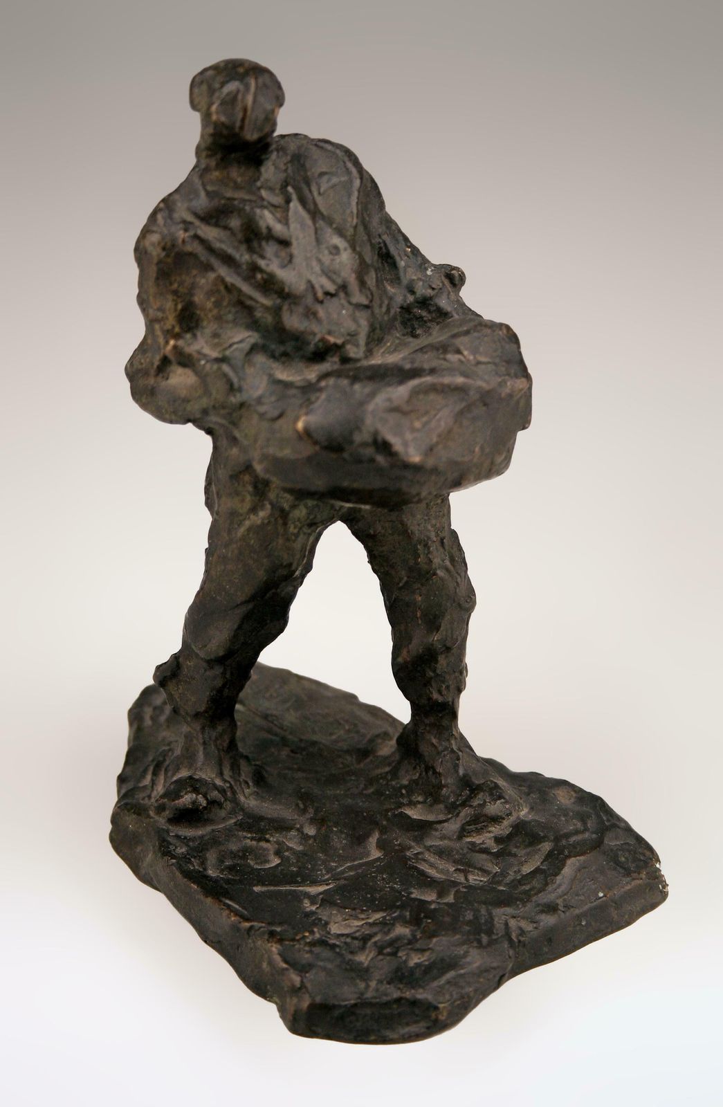 Early 20th Century Patinated Bronze Sculpture Of Carrying Man By Belgian Sculptor Victor Demanet And Bl Paris photo for sale