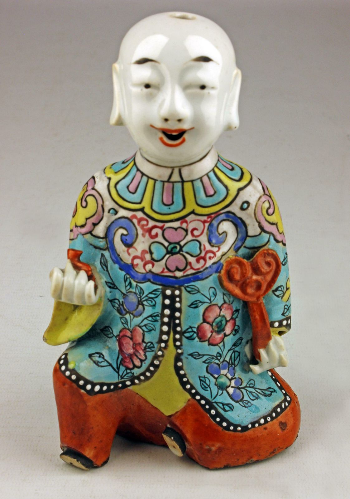 Pair Of Mid 19th Century/Qing Dinasty Enameled Chinese Porcelain Figurines Depicting A Laughing Boy Kneeling And Another Lying Down photo for sale