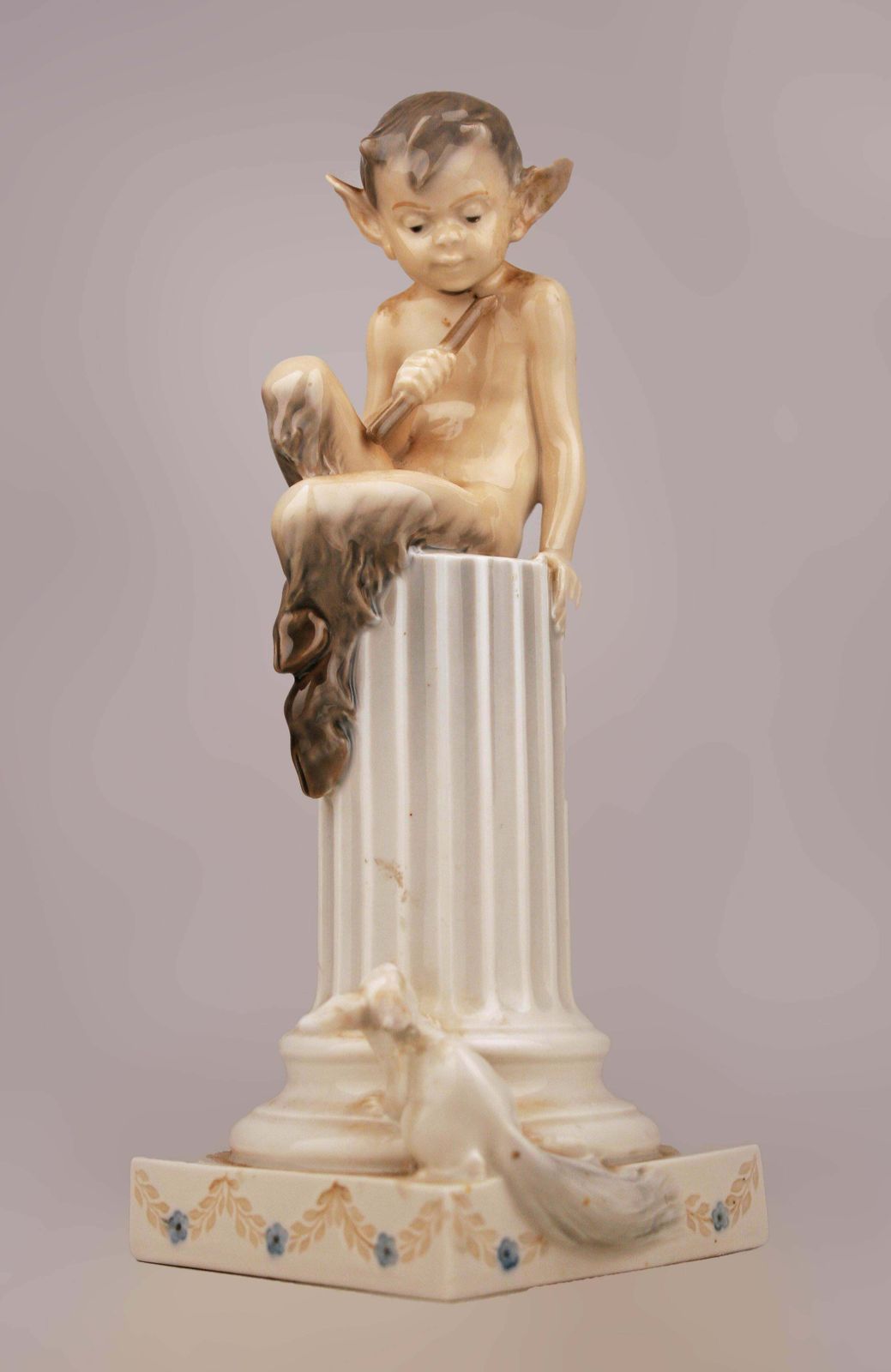 photo for sale Mid 20th Century Danish Glazed Porcelain Sculpture Of Faun (Satyr) Sitting Over A Column And A Rabbit By Danish Firm Royal Copenhagen
