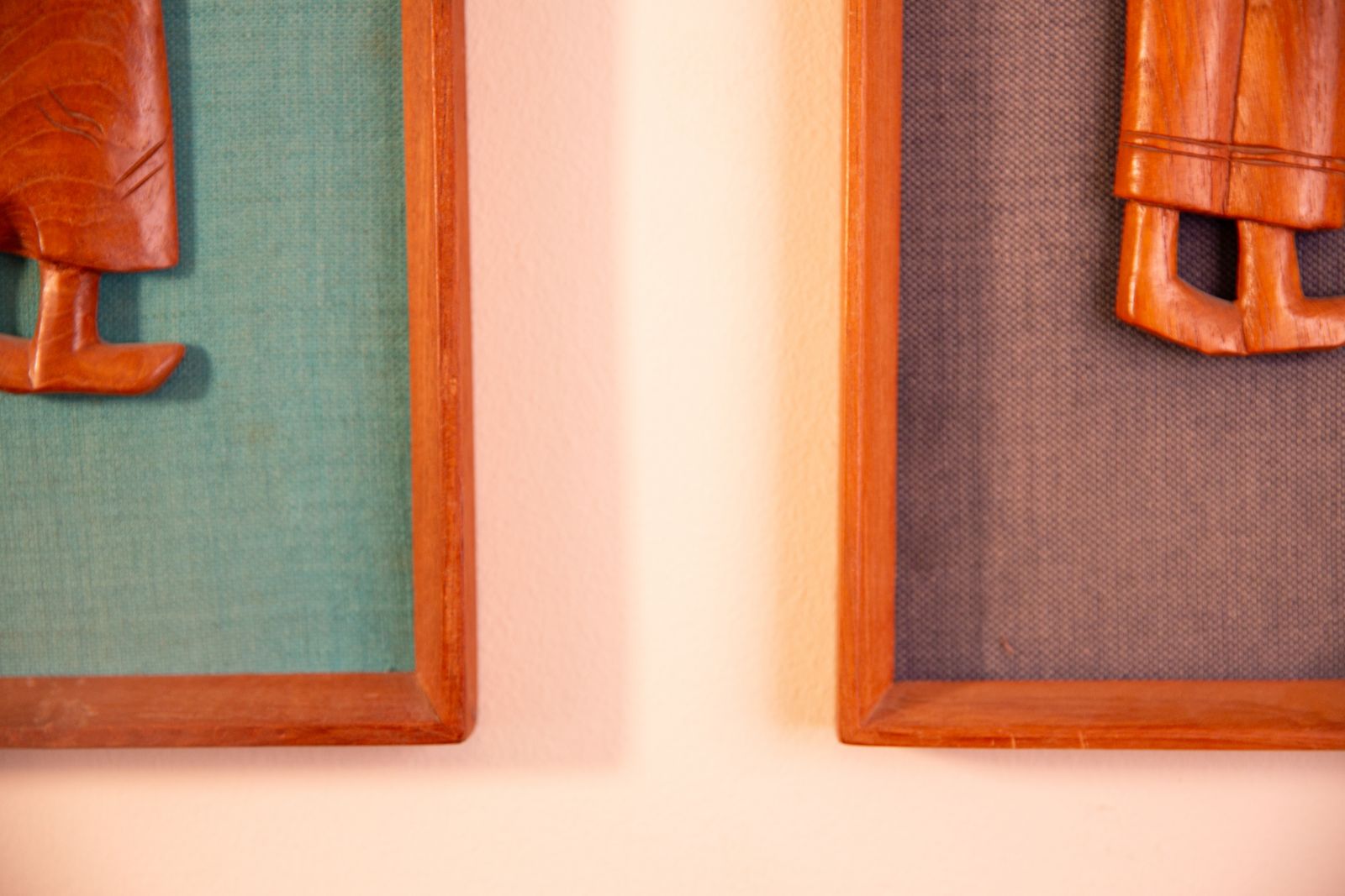 Pair Of Mid Century South East Asian Hardwood Wall Sculptures On Blue Canvas In Teak Frames photo furniture
