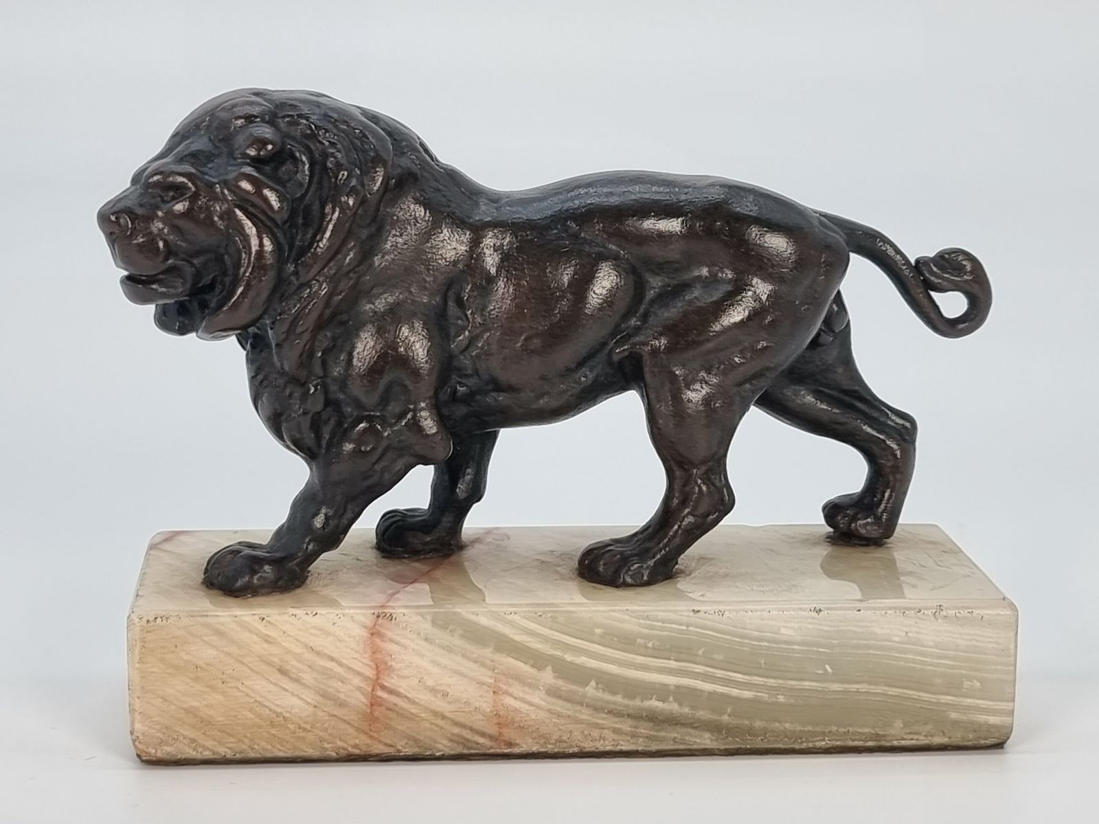 A French Late 19th Century Bronze Study Of A Prowling Lion