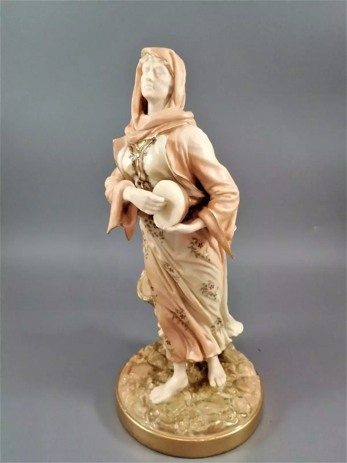 A Rare Royal Worcester Figurine Titled "Musician," Depicting A Lady With A Drum photo furniture