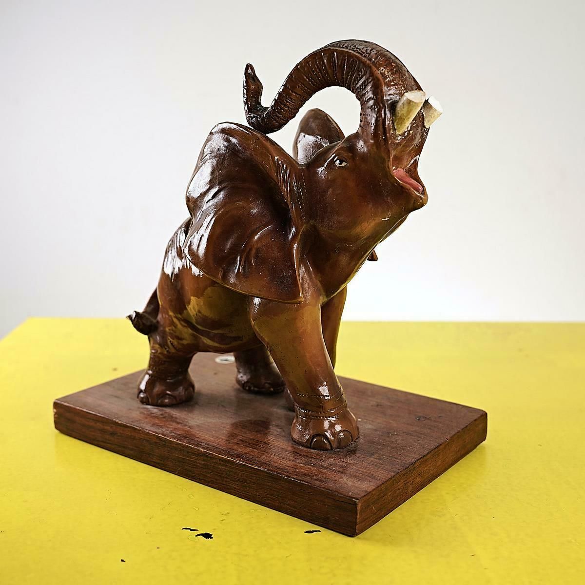 Glazed Terracotta Elephant With Vintage Wooden Base photo vinterior