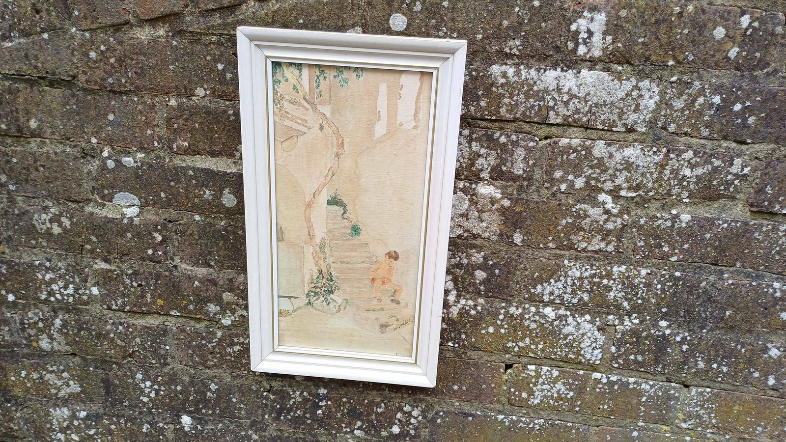 Vintage Watercolour Of A Mediterranean Village Scene, Boy On Steps Enjoying Hot Weather. Small Vertical Painting In Glazed Retro Frame. photo furniture