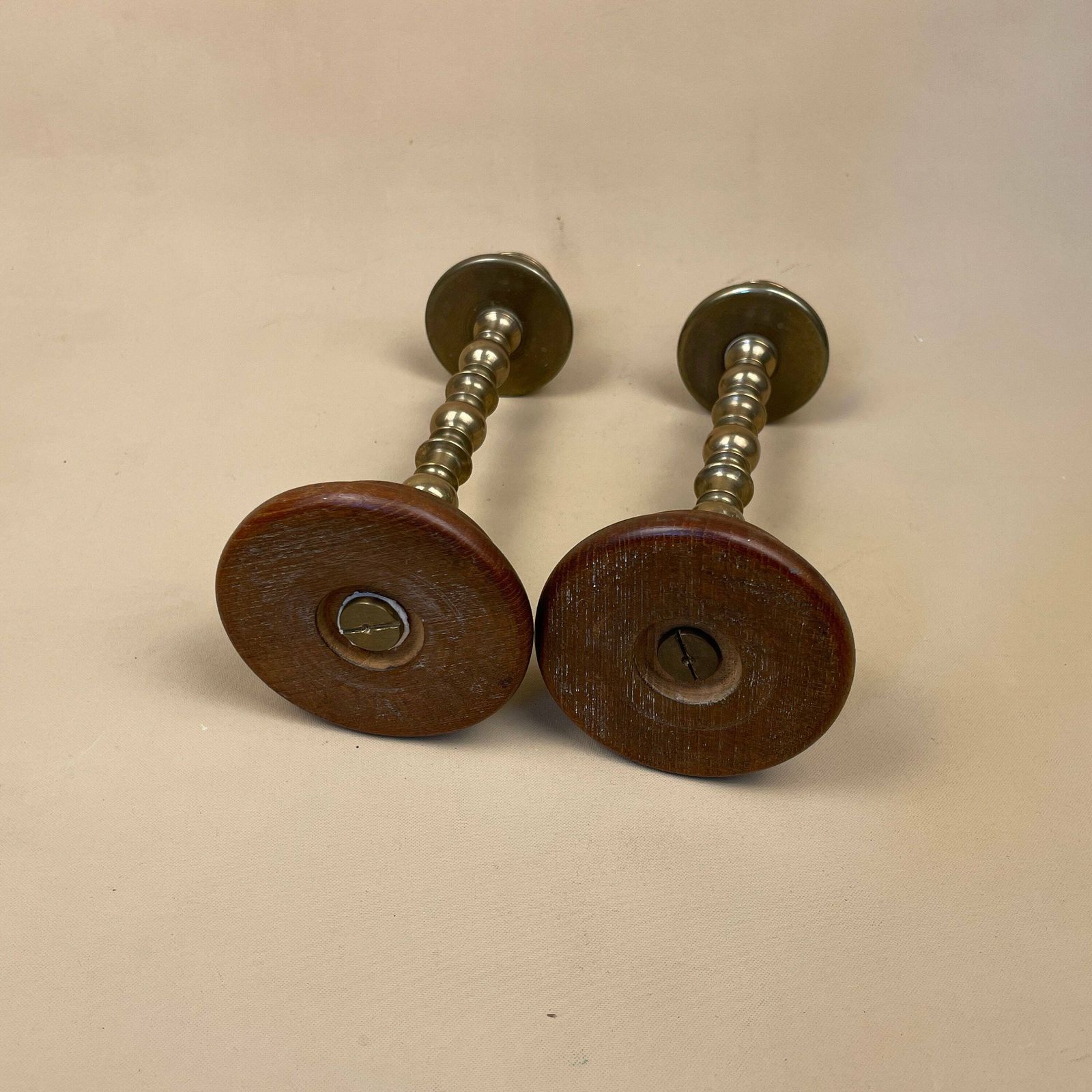 Antique Matching Pair Of Gold Solid Brass Metal Candlestick Candle Stick Vintage Column Taper Dinner Candlesticks Wood Wooden Base photo vintage
