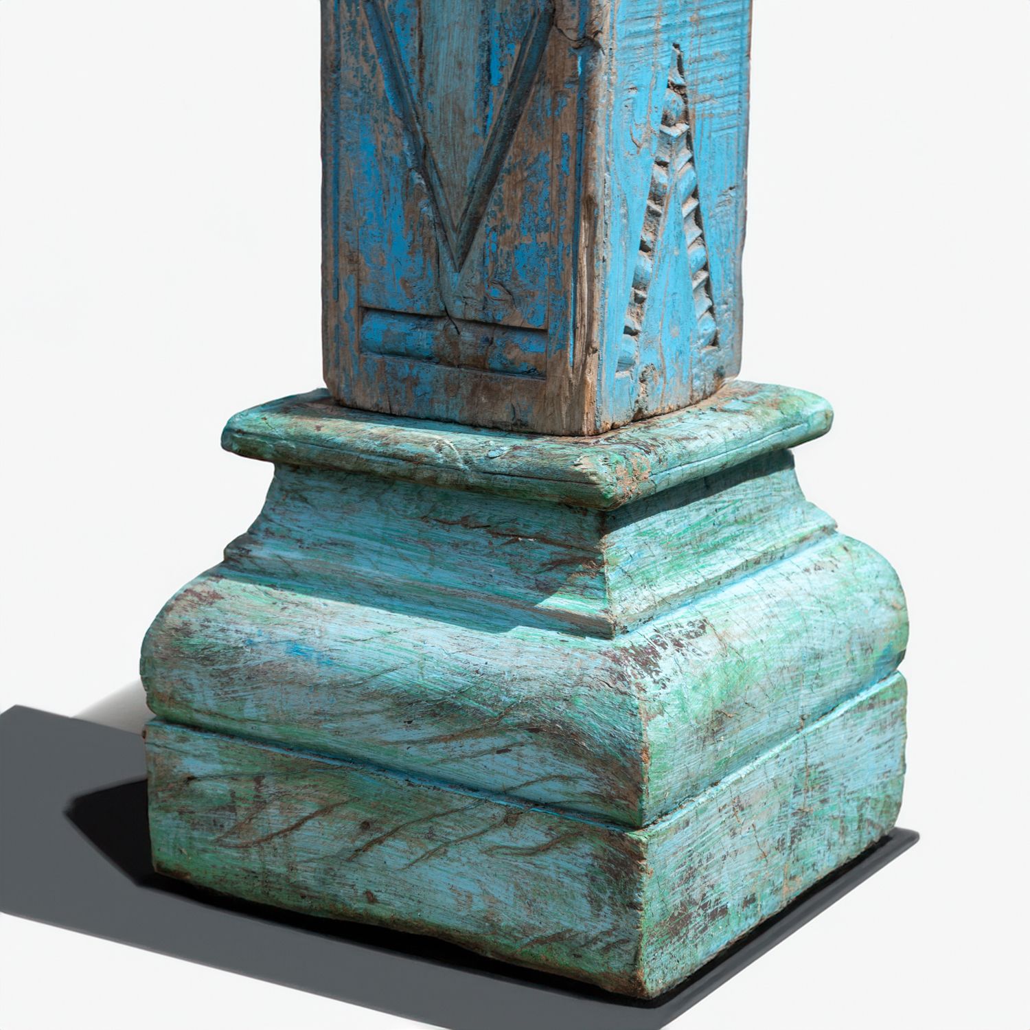 Pair Of Reclaimed Blue Carved Indian Columns On Wooden Plinths photo for sale