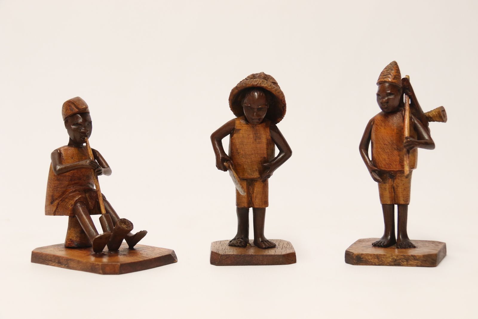 A Group Of 7 Nigerian Hardwood Carved Figures, C 1920 photo vintage