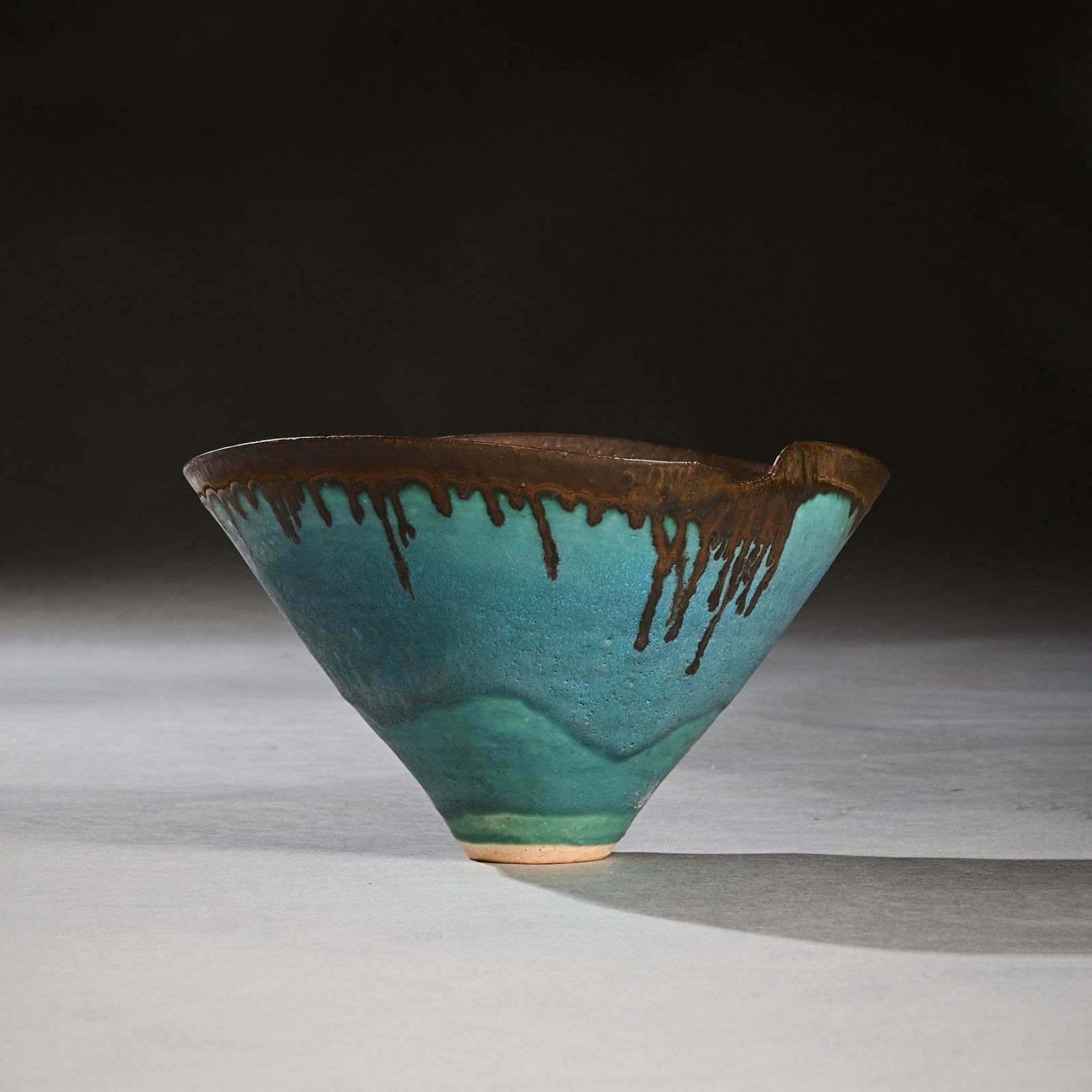 A Fine Dame Lucie Rie Turquoise Blue Stoneware Bowl With Dripping Manganese Glaze And Wavy Rim