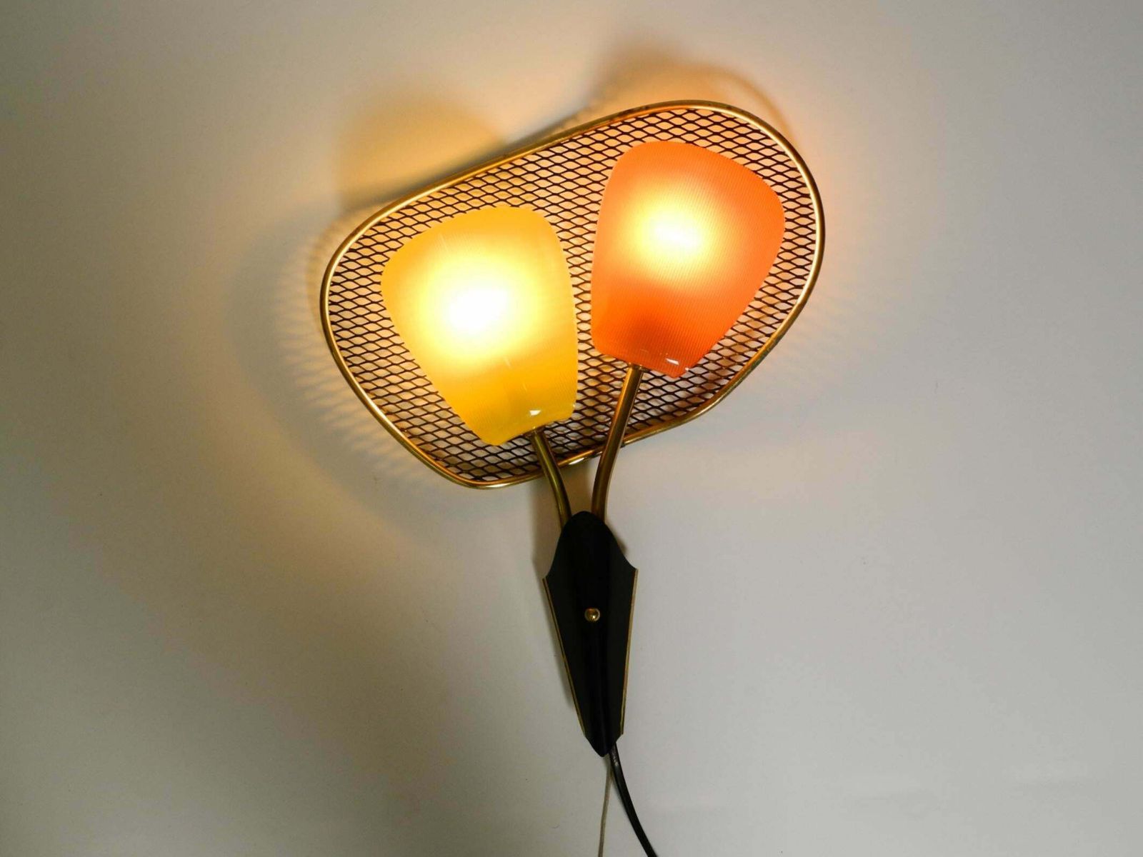 Pair Of Large Mid Century Expanded Metal Wall Lamps With Plexiglass Shades photo for sale