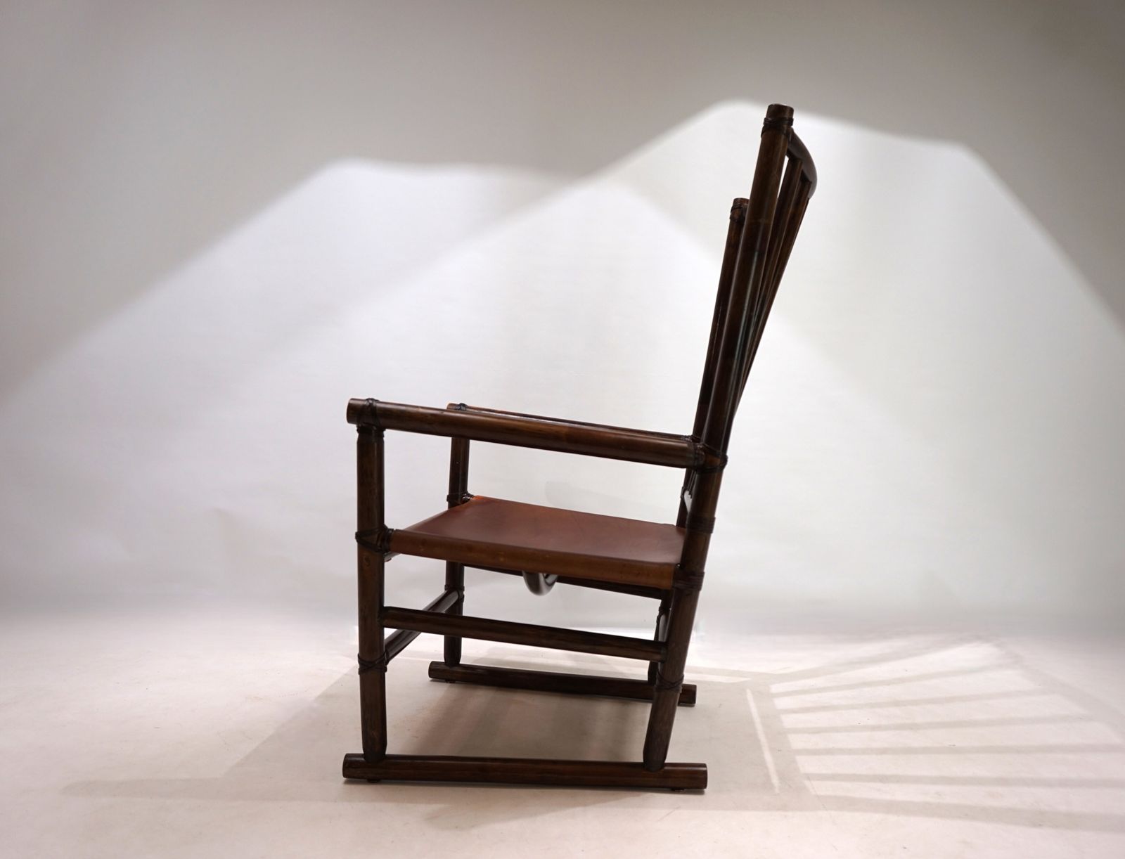 photo furniture Manou Rattan Armchair With Leather Seat, 1960