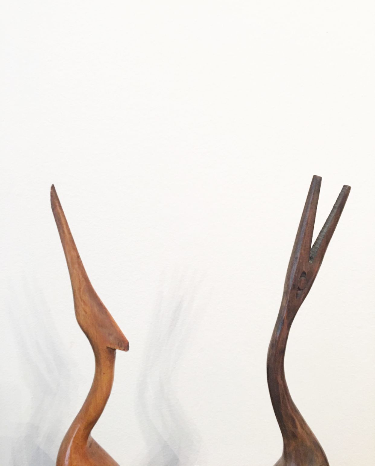 photo for sale Herons   Two Wooden Statues