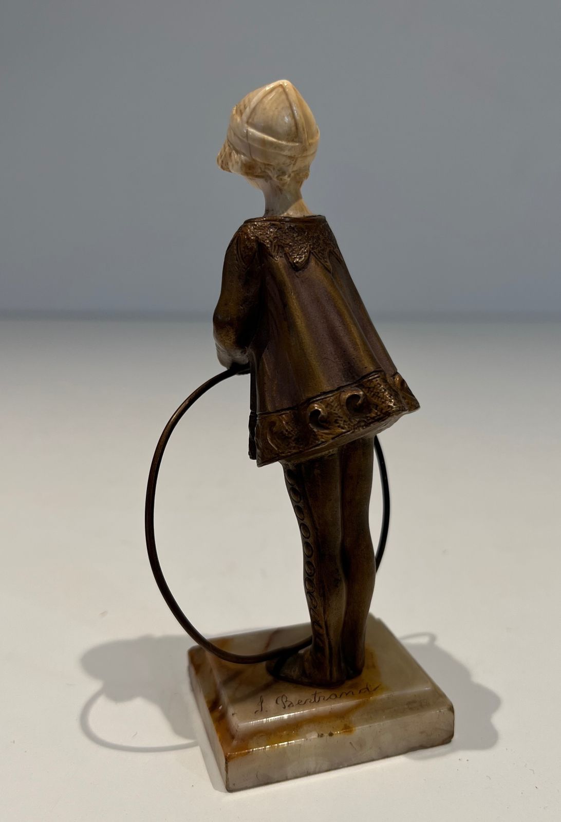 photo furniture Chryselephantine Representing A Young Girl With A Hoop Signed Bertrand On Its Onyx Base