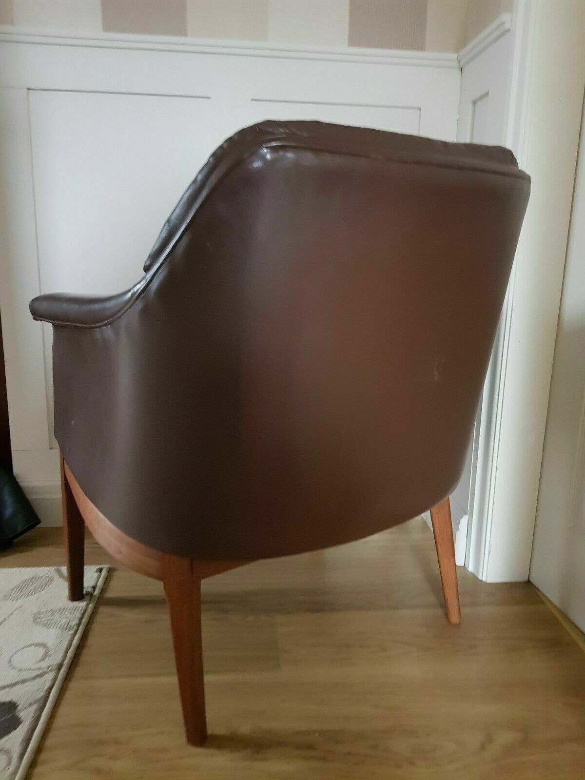 photo furniture A Leather Mid Century Armchair By Jens Risom