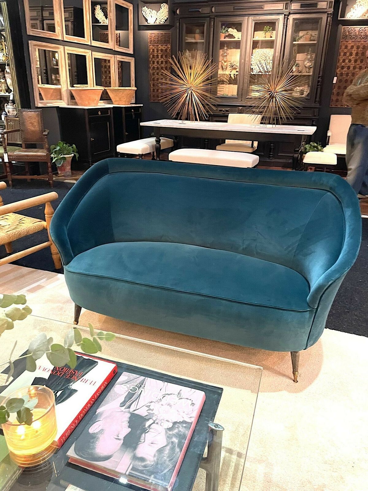 photo for sale An Orignal Italian 1950s Two Seater Sofa With Curved Back, With Brass And Wooden Feet