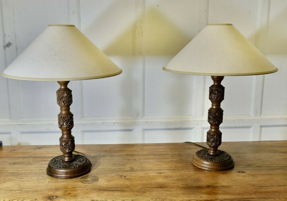 A Pair Of Teak Carved Tree Of Life Table Lamps photo vinterior