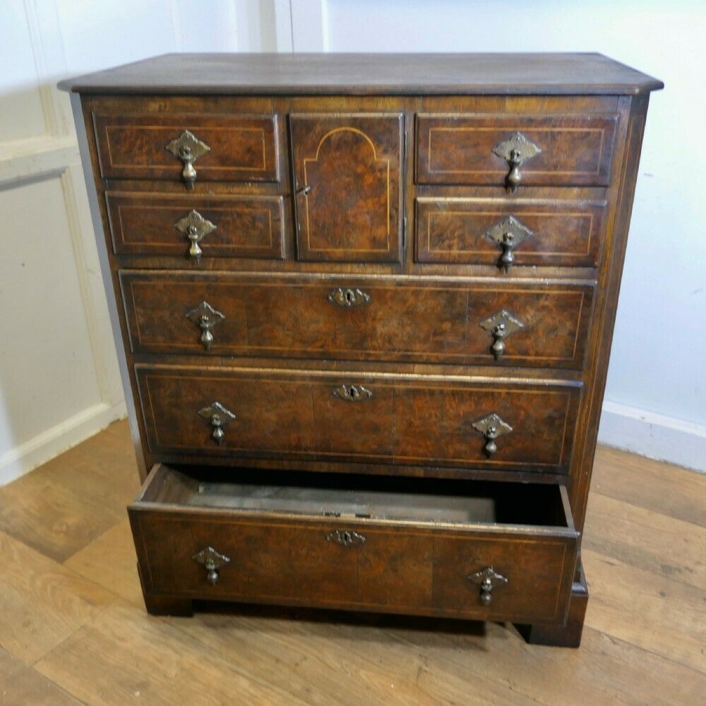photo furniture A Fine Bur Walnut And Oak Chest Of Drawers