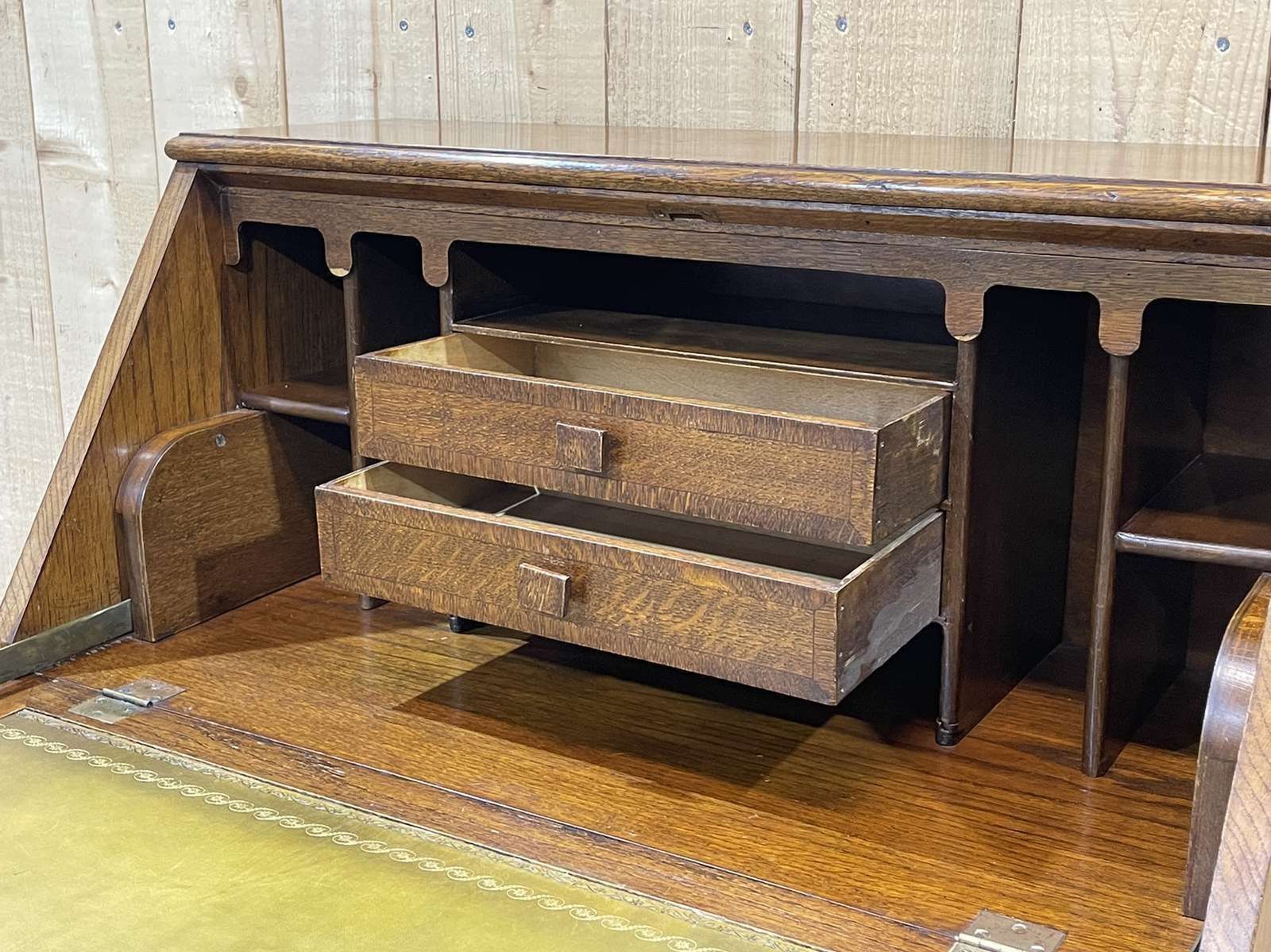 photo for sale English Speed Bump Desk In Oak And Leather, From The 1950s