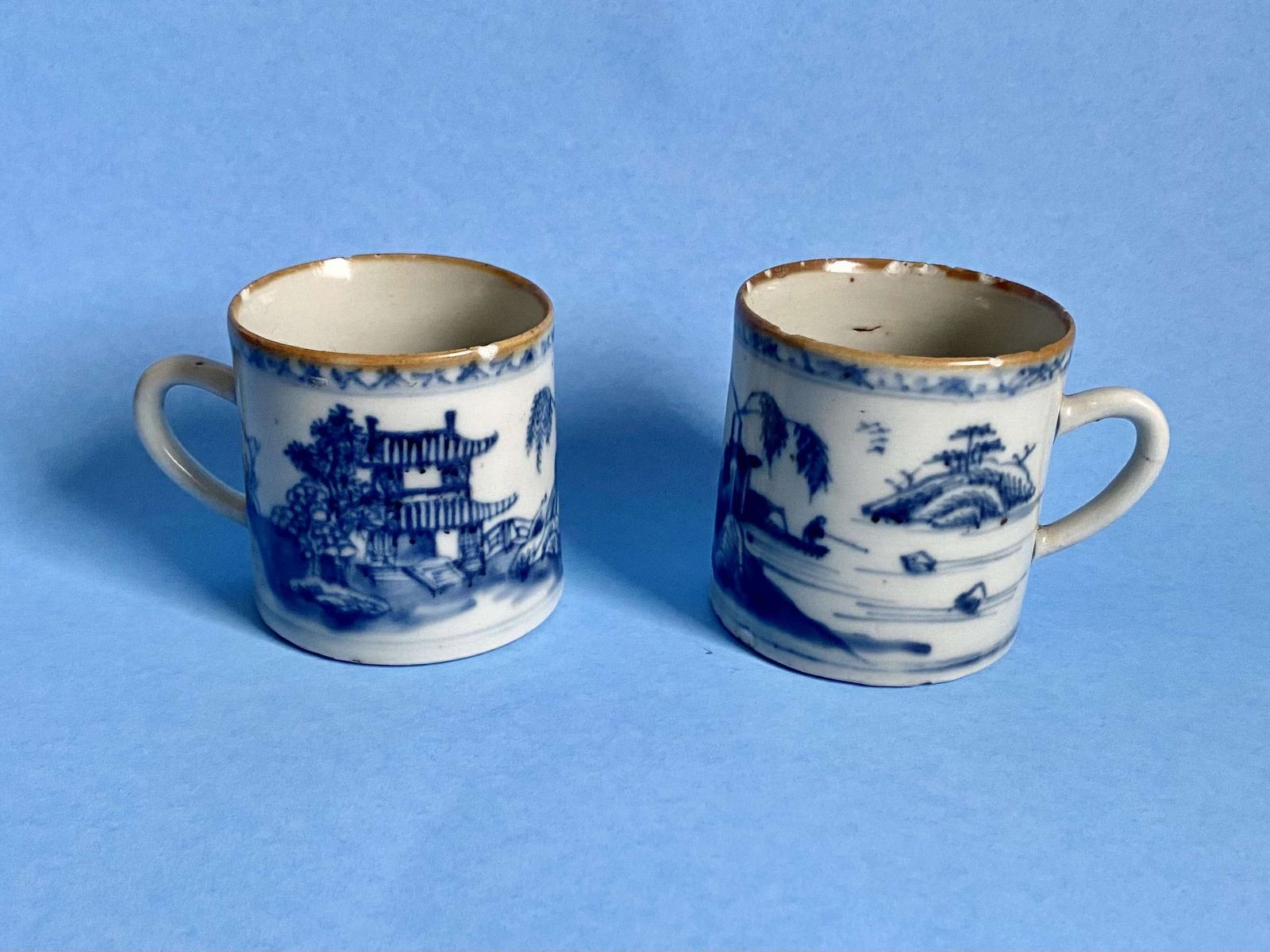 A Pair Of 18th Century Chinese Blue And White Porcelain Mugs