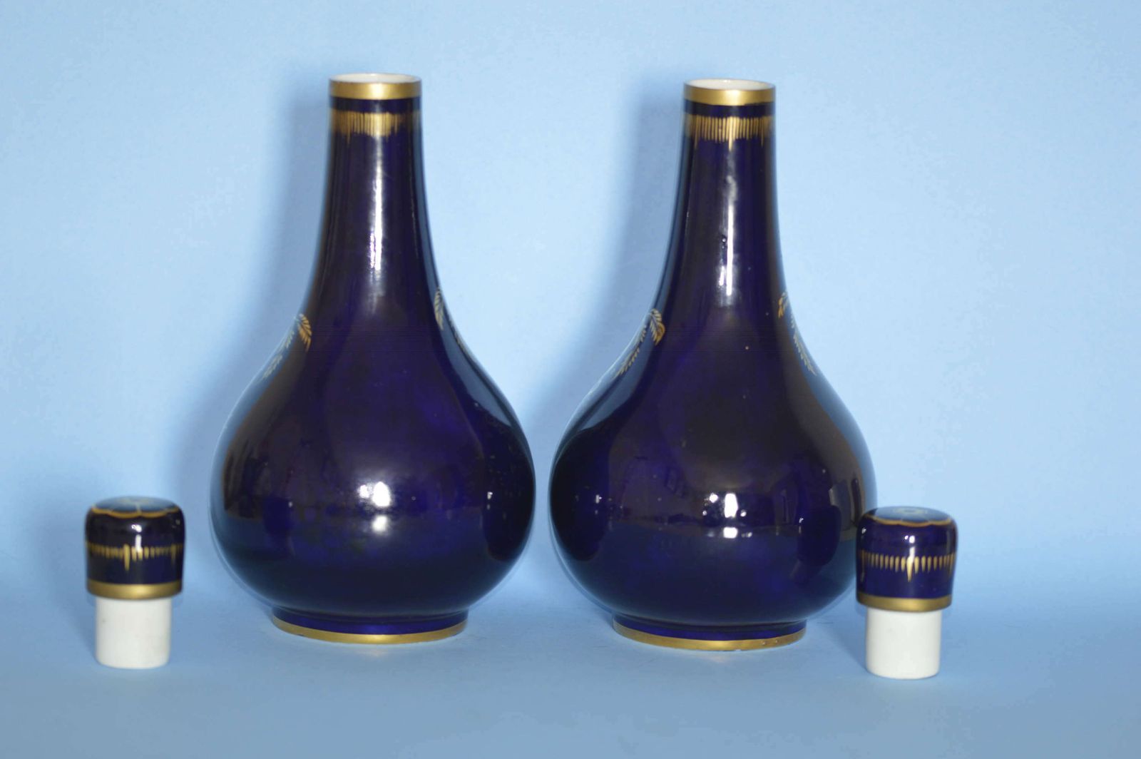A Pair Of C1830 Derby Porcelain Blue Ground Bottle Vases And Covers photo buy