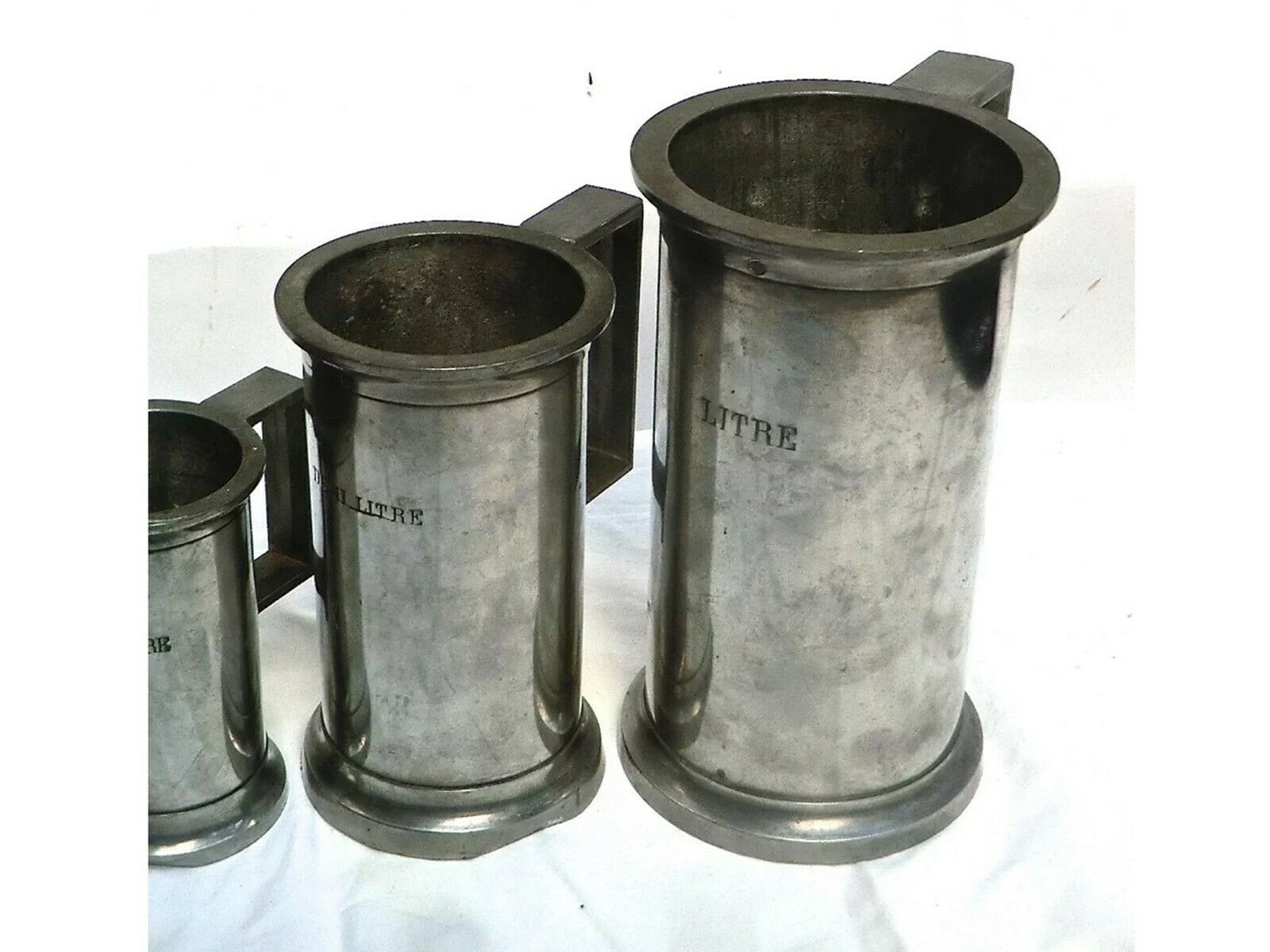 Set Of Antique Pewter Spirit Measures From France photo for sale