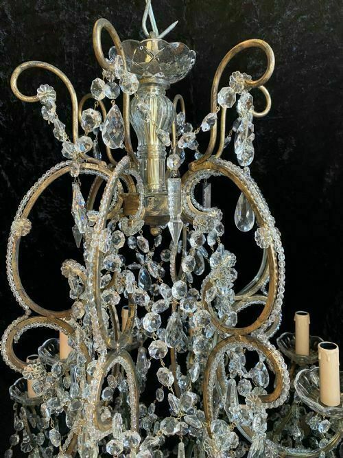 A Large Pair Of Eighteen Light Florentine Antique Chandeliers photo for sale