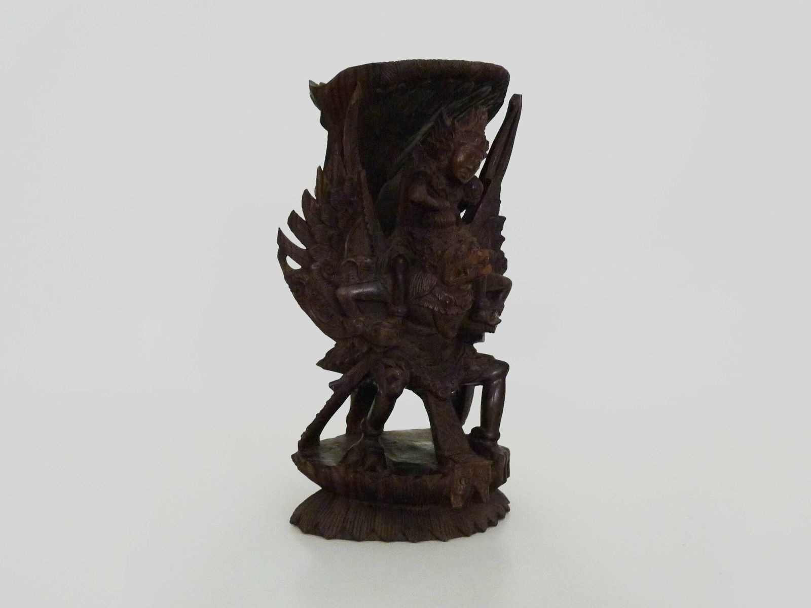 Carved Wooden Statue Of Vishnu Riding Garuda. Bali Indonesia. 1930s photo furniture