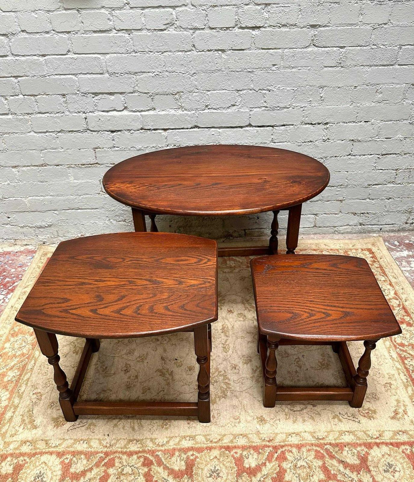 photo furniture Vintage Old Charm Wood Bros / Oval Oak Nest Of 3 Tables / Tudor Brown