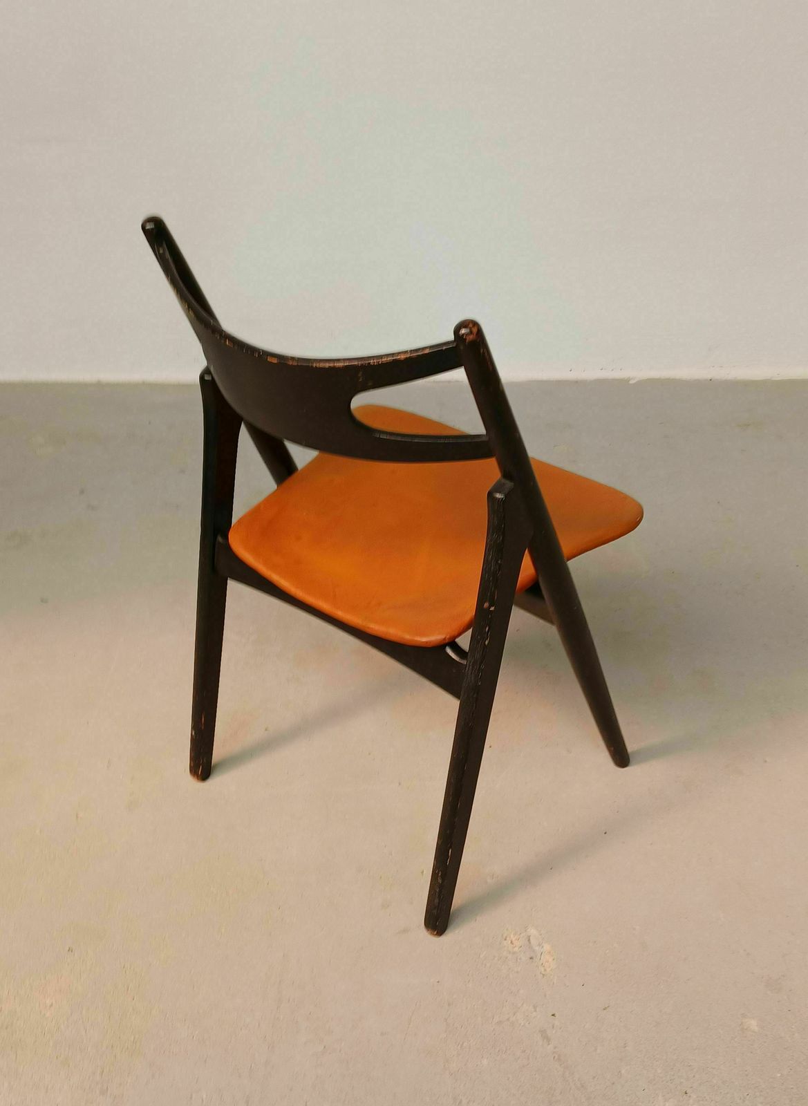 Furniture Patinated Hans Wegner Sawbuck Chair With Original Leather 1950s photo
