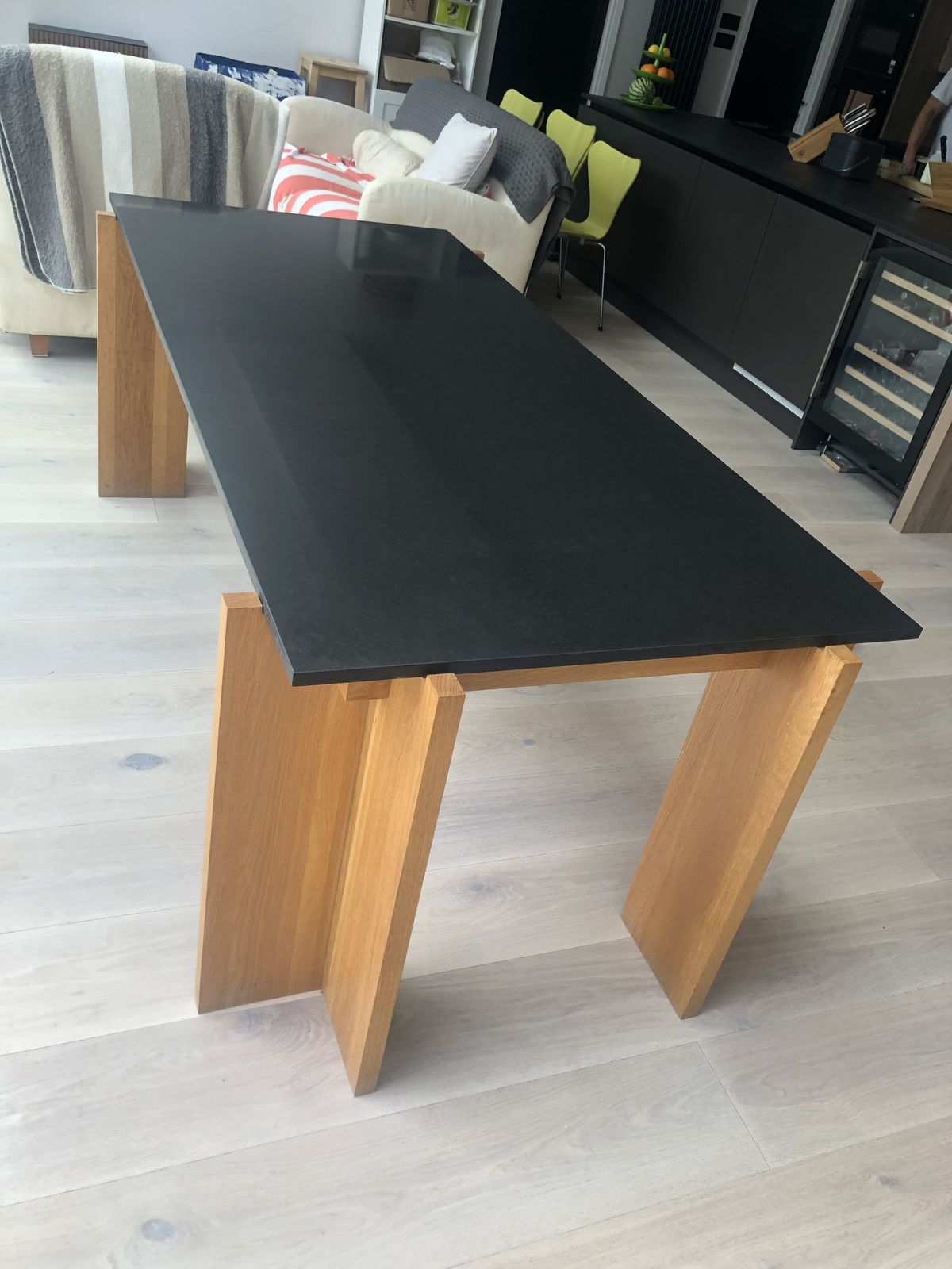 Heals Black Granite And Oak Leg Dining Table In Excellent Condition.  Smooth Black Granite Top, Four Square Oak Legs.  Easy To Transport (Although Heavy Top) As Top Lifts Off A Rectangular Oak Frame And The Four Oak Legs Are Then Removed Separately. photo for sale