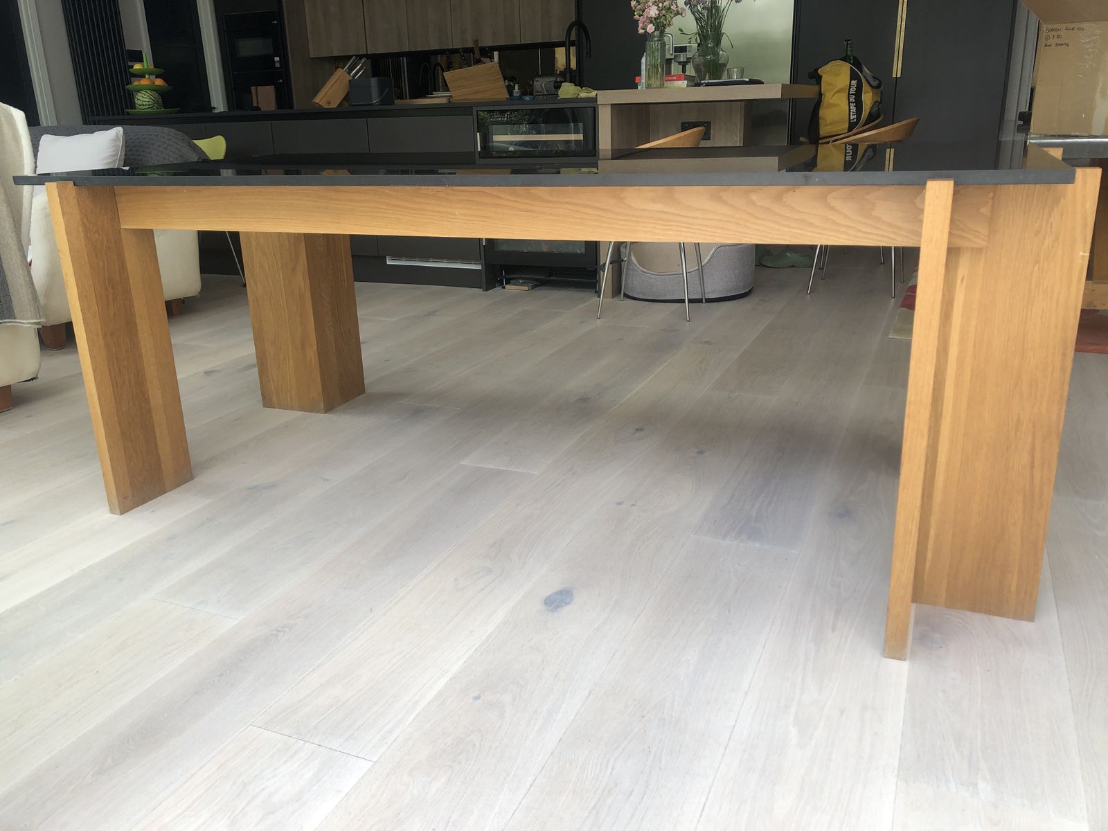 Heals Black Granite And Oak Leg Dining Table In Excellent Condition.  Smooth Black Granite Top, Four Square Oak Legs.  Easy To Transport (Although Heavy Top) As Top Lifts Off A Rectangular Oak Frame And The Four Oak Legs Are Then Removed Separately. photo 1000.0
