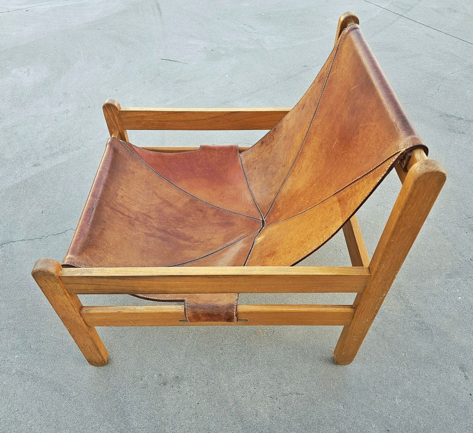 Brazilian Mid Century Modern Cognac Leather Sling Chair With Beautiful Patina // Made In Brazil In 1970s photo vintage
