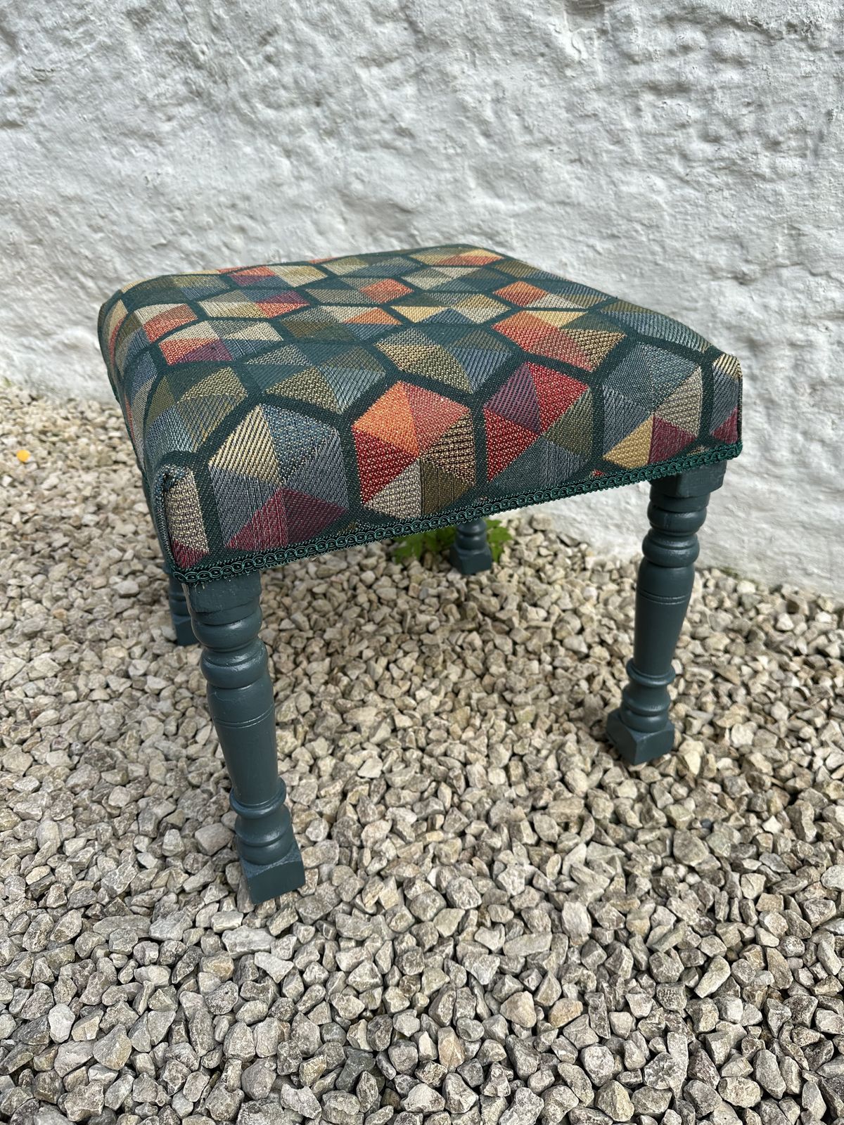 Footstool With Retro Geometric Upholstery, Green Trim And Reclaimed Painted Legs