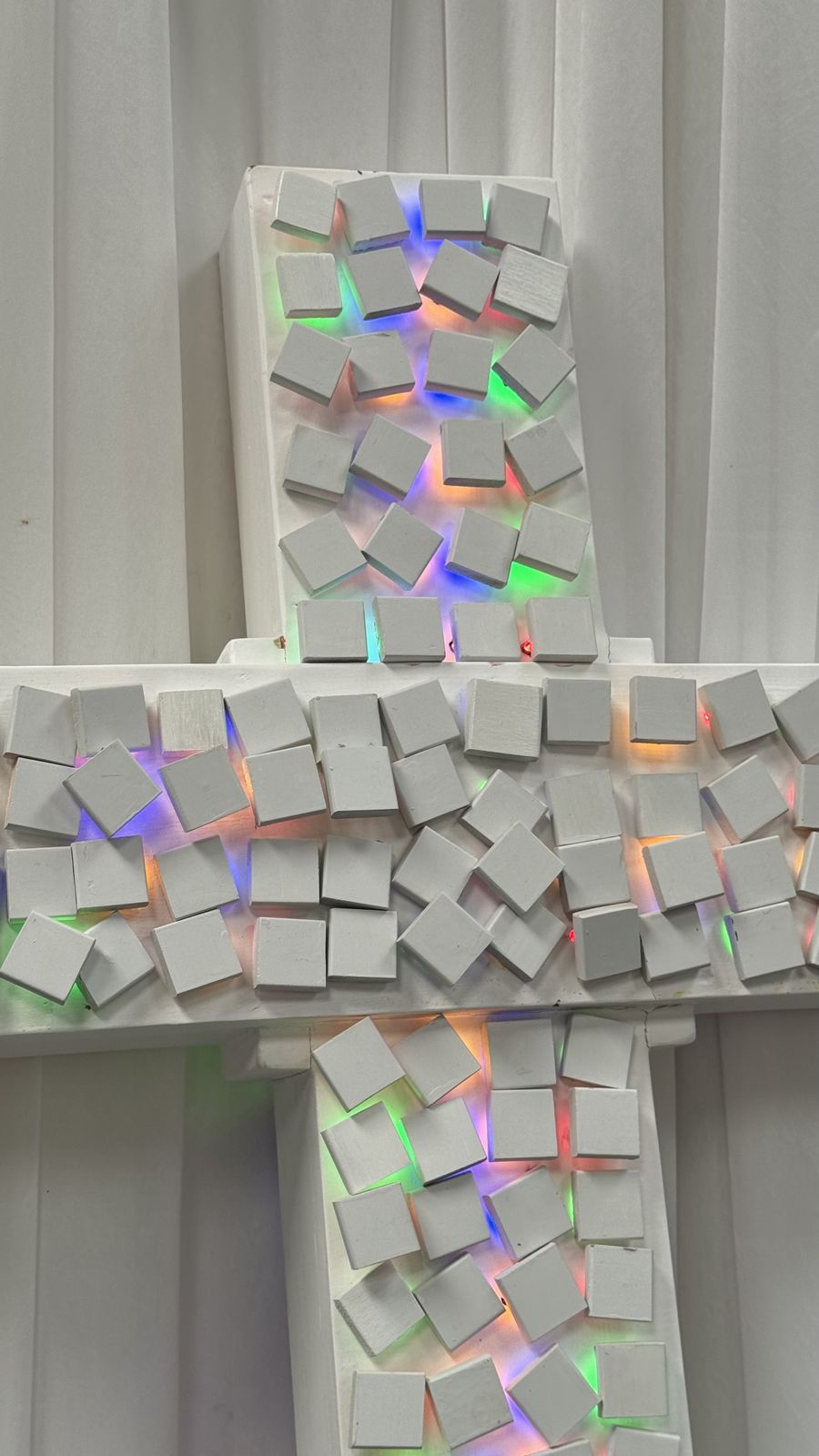 Contemporary Artwork In The Form Of An Illuminated Cross photo vinterior