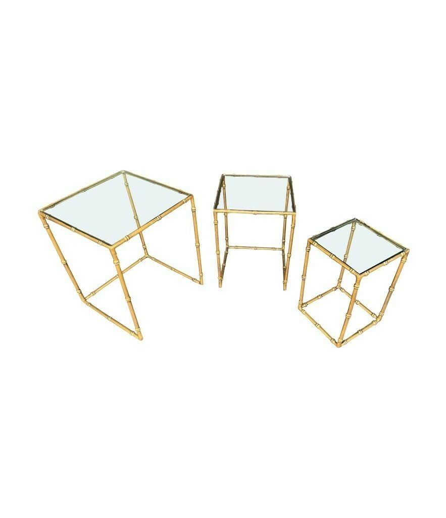 A Set Of Three French 1970s Faux Bamboo Gilt Metal Nest Of Tables, With Glass Shelves photo for sale