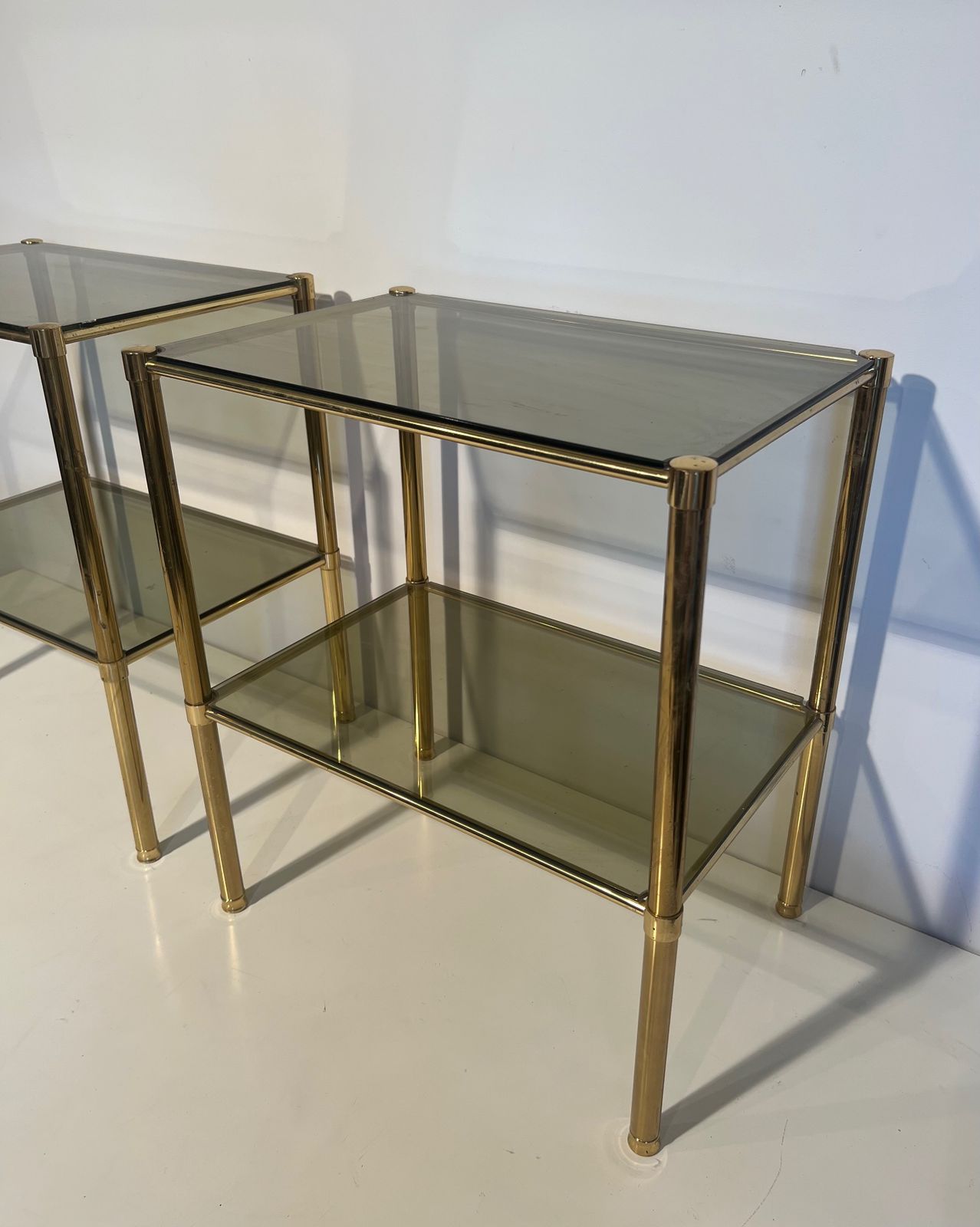 Pair Of Brass End Tables With Smoked Glass Trays. Circa 1970 photo buy