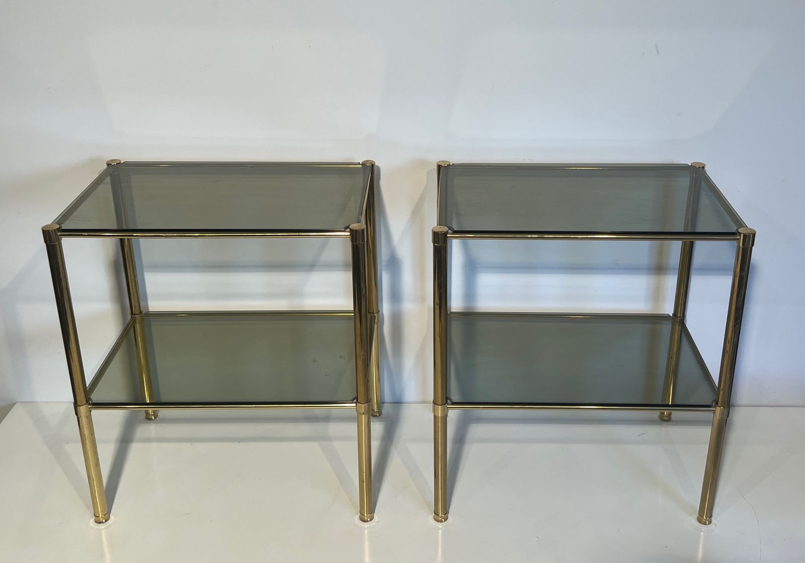Pair Of Brass End Tables With Smoked Glass Trays. Circa 1970 photo vintage