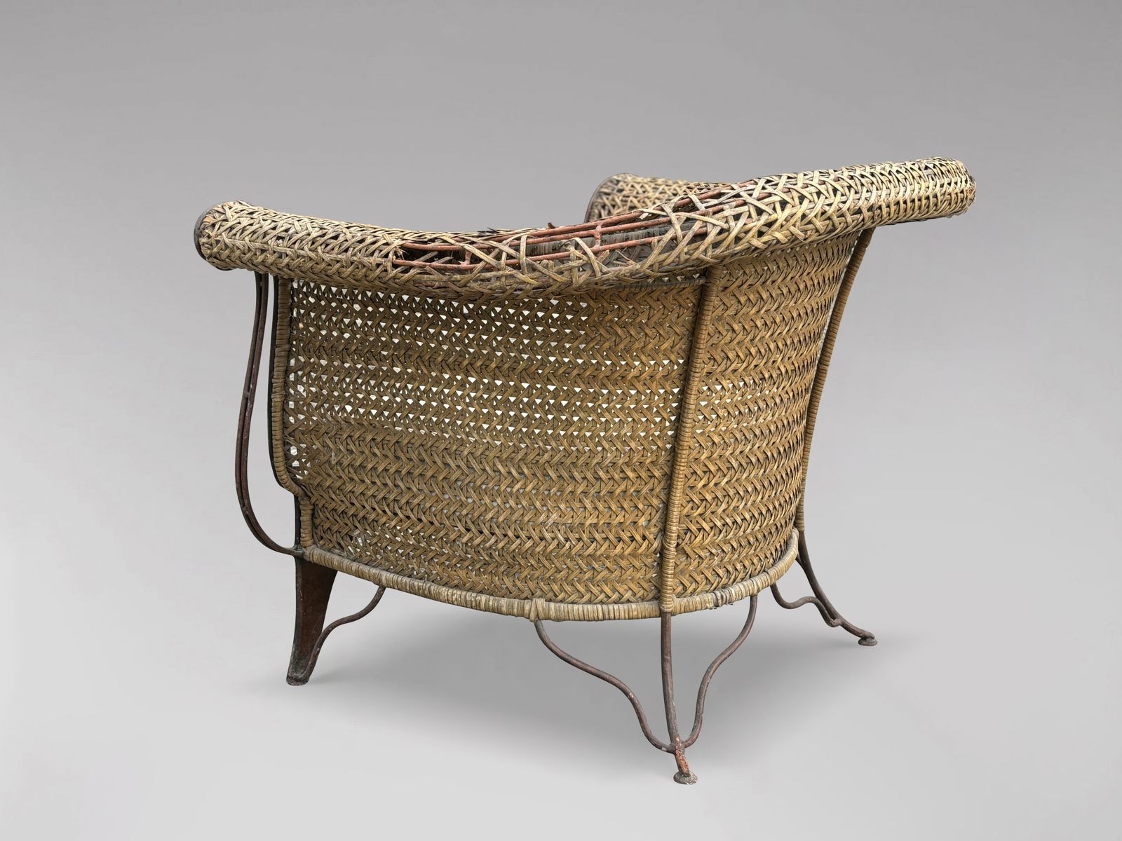 photo furniture Pair Of 1970s Woven Rattan Lounge Armchairs