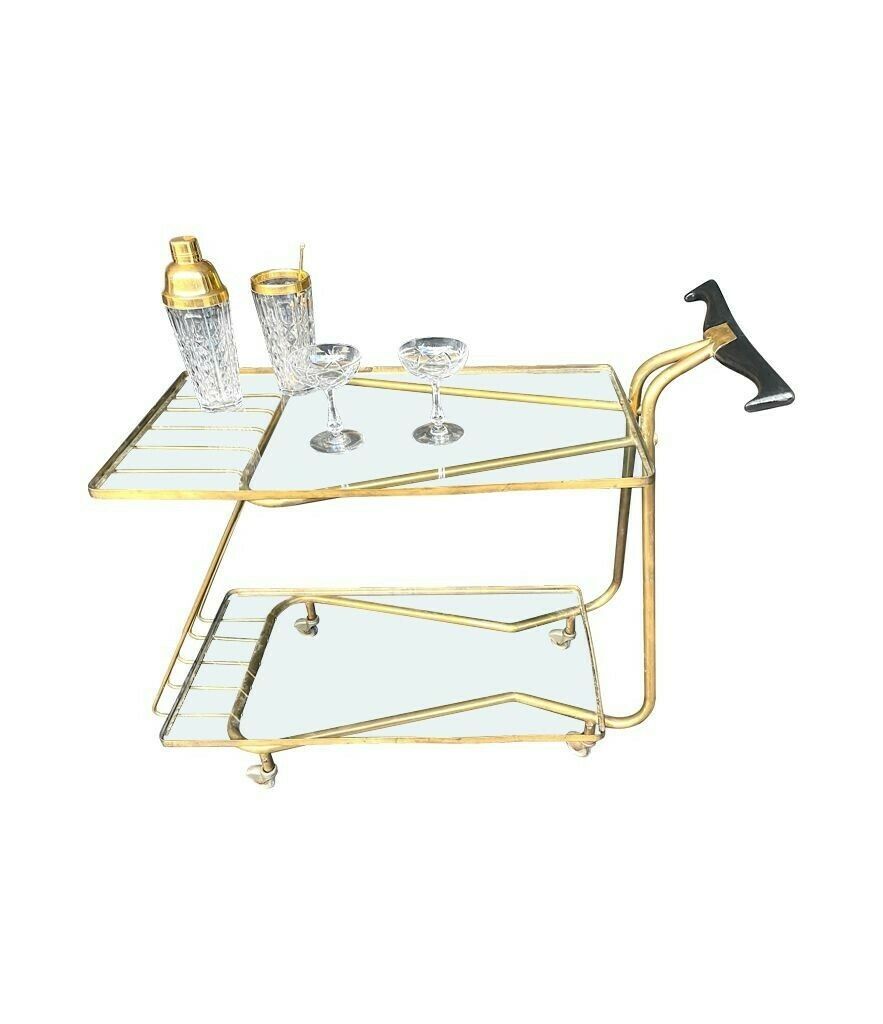 photo furniture An Unusual Designed Italian 1950s Brass Bar Trolley