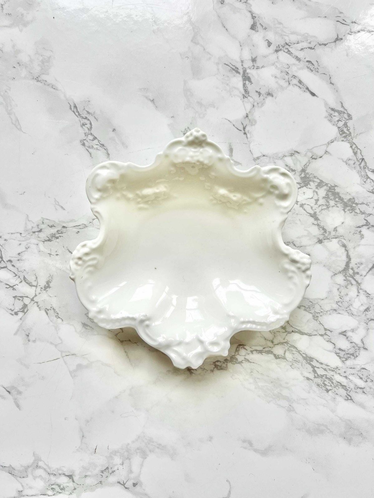Royal Crown Derby   Antique Shell Shaped Dish In Molded White Porcelain With A Baroque Decoration Of Flowers