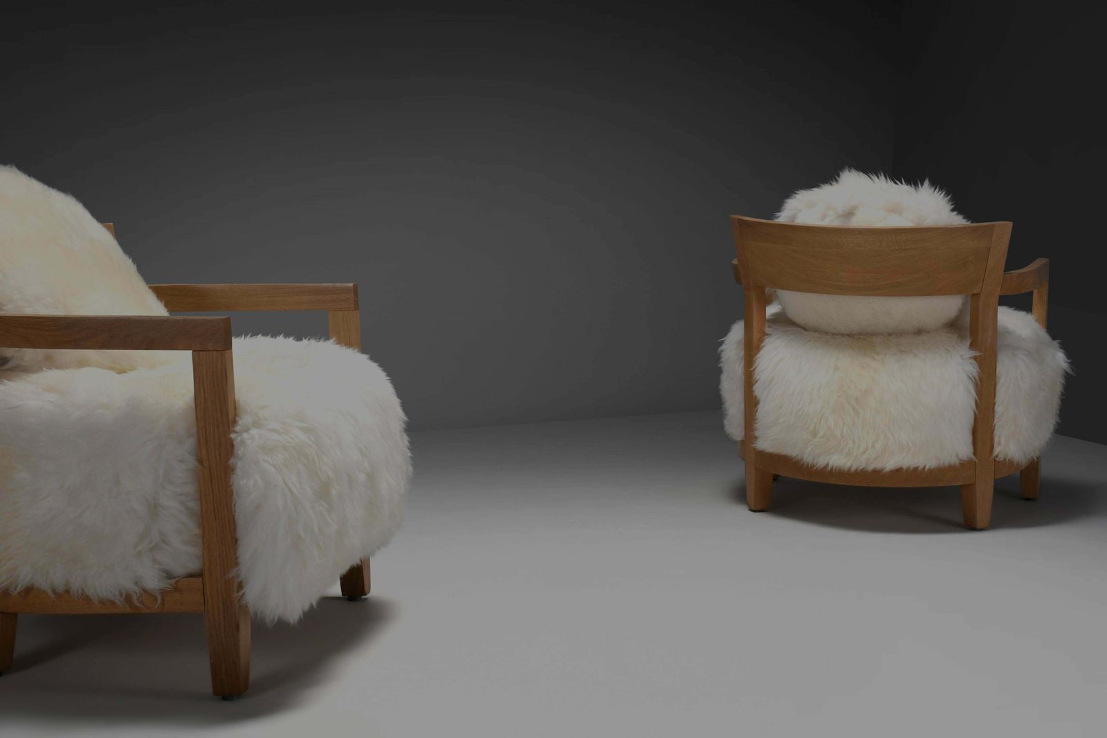 Set Of Two Solid Oak And Off White Sheepskin Chairs, Switzerland, 1970s photo vinterior