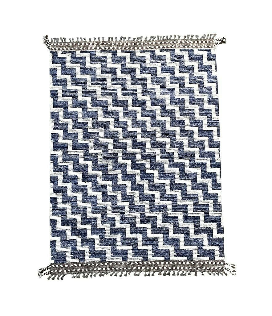 A Handmade Morrocan Beni Ourain Berber Rug With Blue And White Stepped Design. photo vinterior