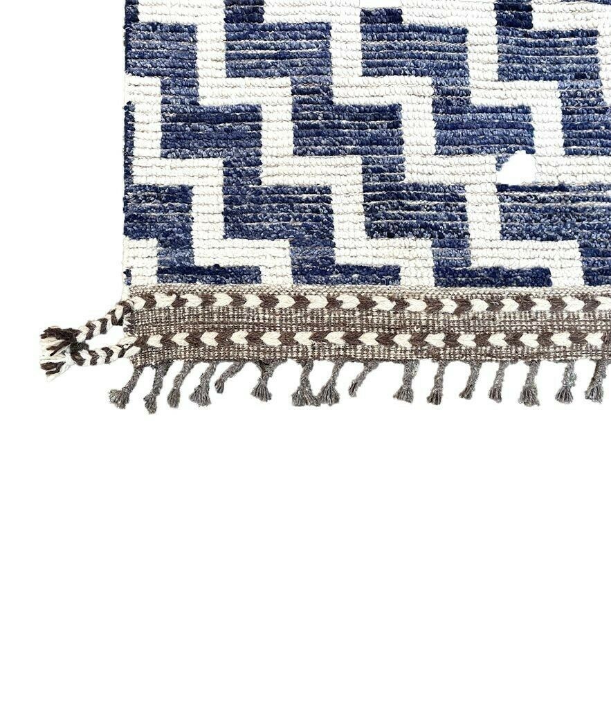 photo furniture A Handmade Morrocan Beni Ourain Berber Rug With Blue And White Stepped Design.
