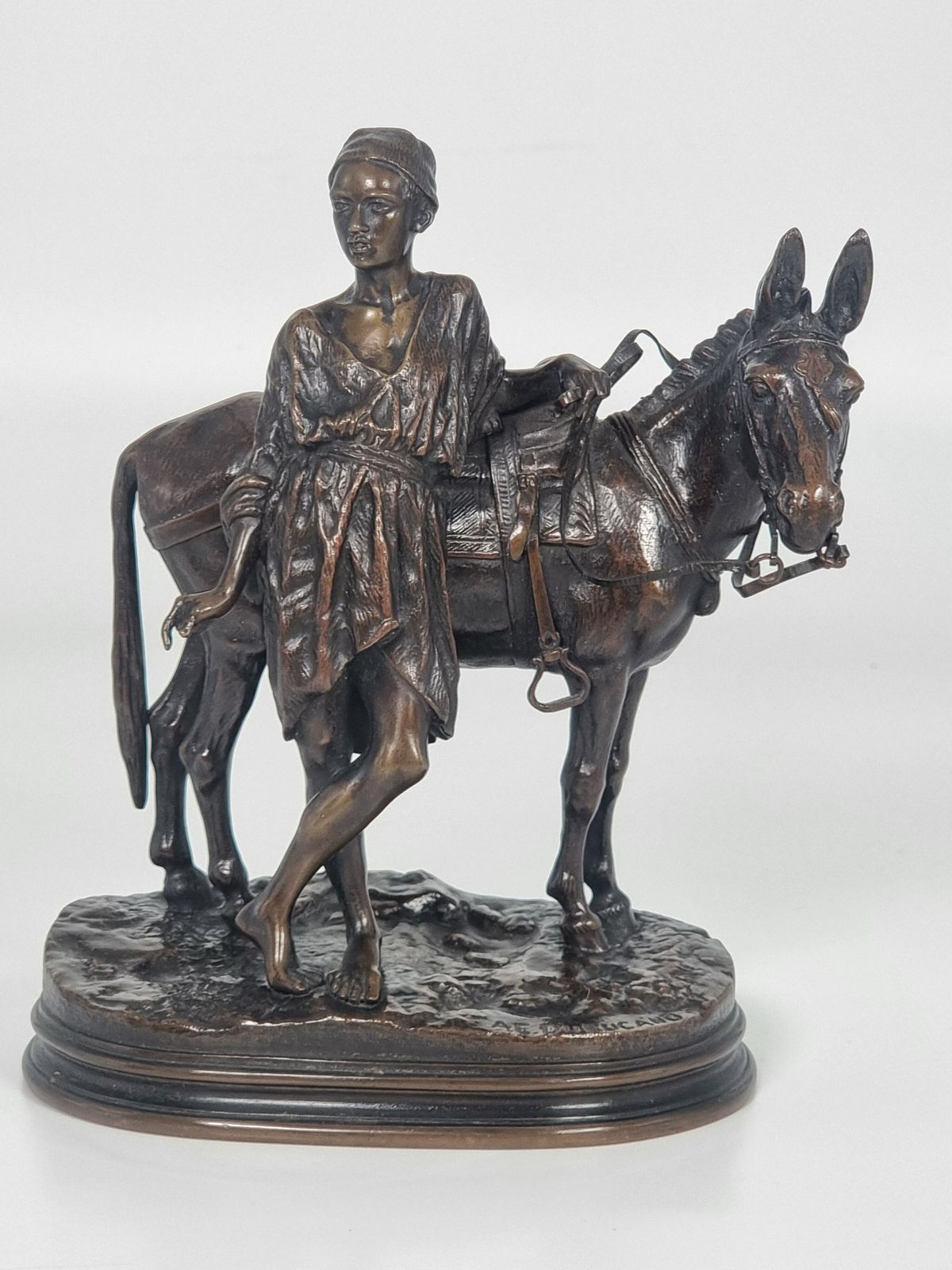 19th Century French Bronze Sculpture Depicting A Boy With His Mule By A E Dubucand Circa 1870