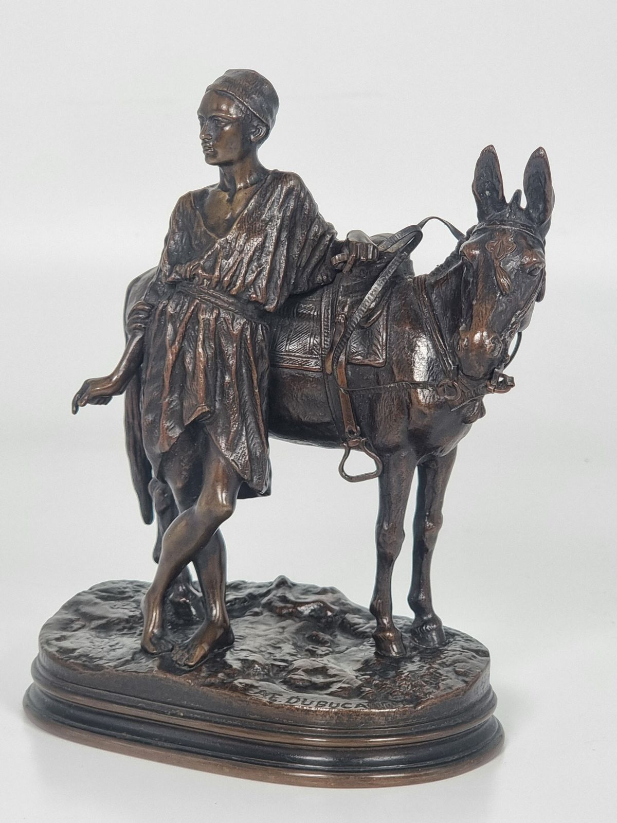 19th Century French Bronze Sculpture Depicting A Boy With His Mule By A E Dubucand Circa 1870 photo furniture